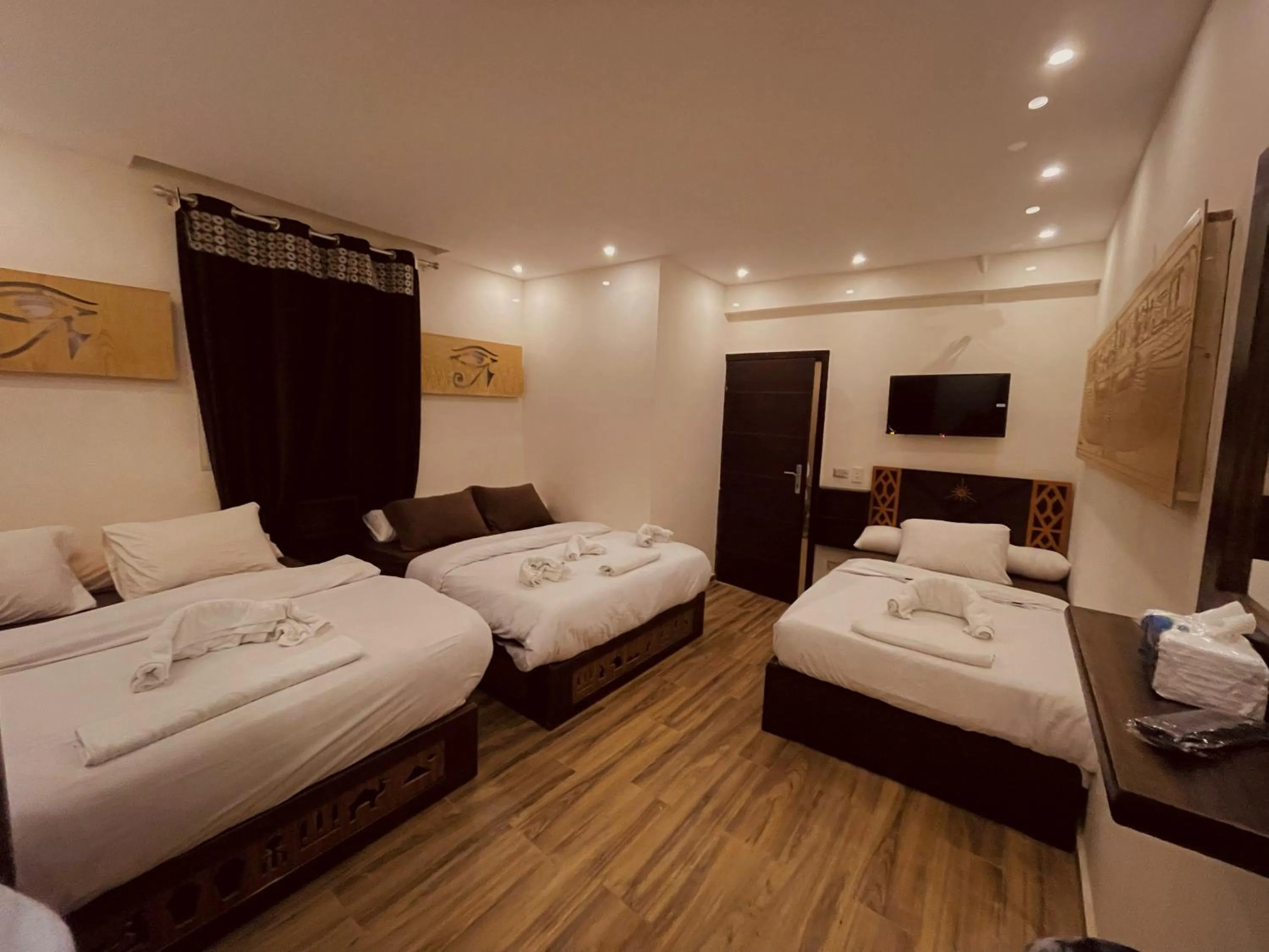 Bed in Sahara Pyramids Inn