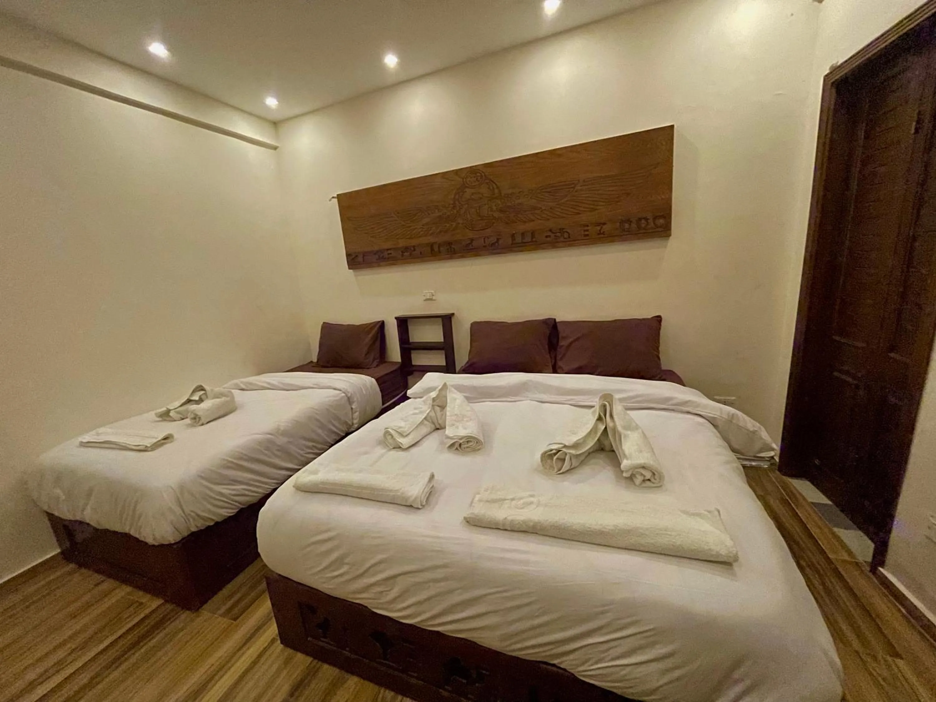 Bed in Sahara Pyramids Inn