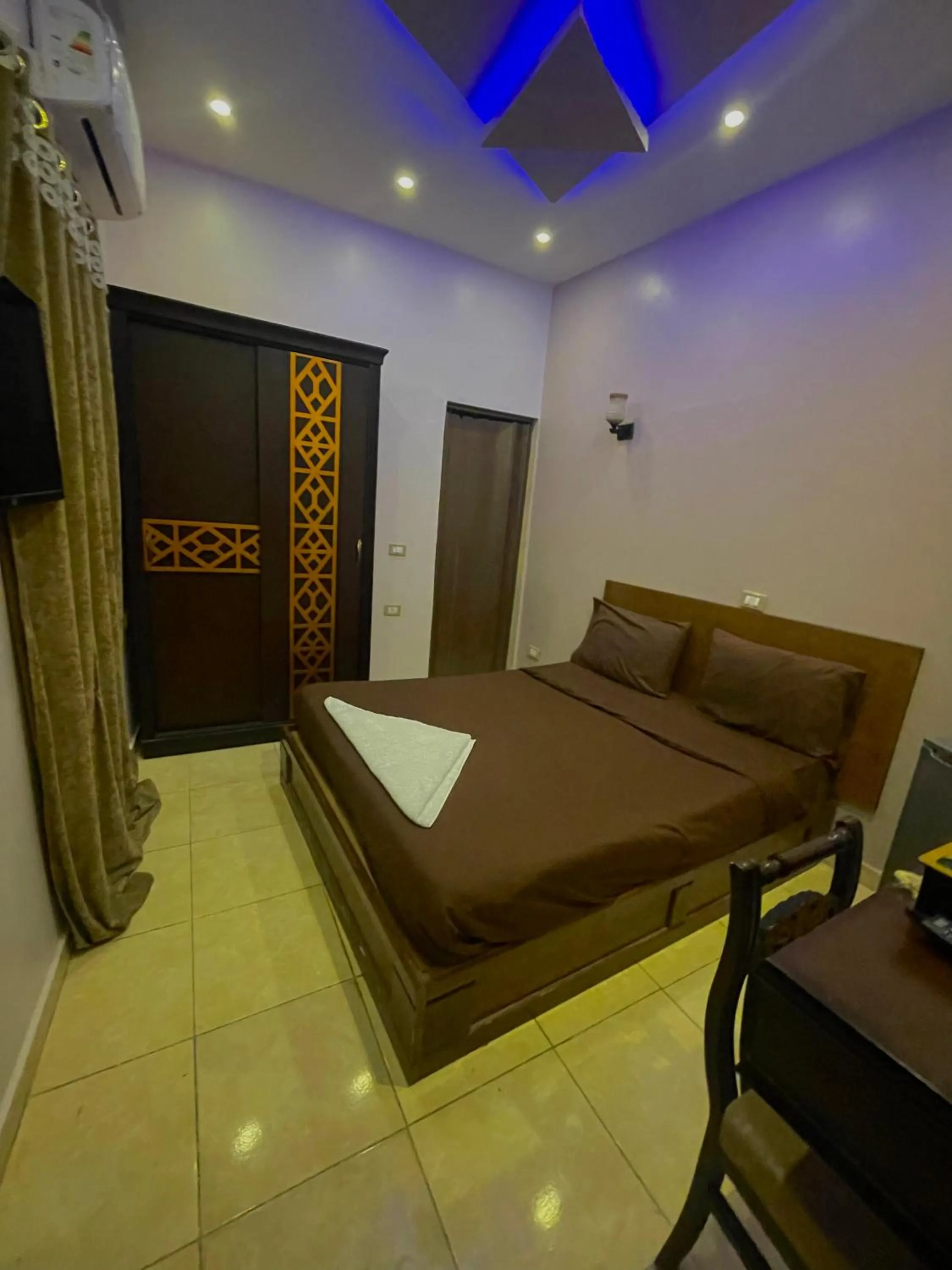 Bed in Sahara Pyramids Inn