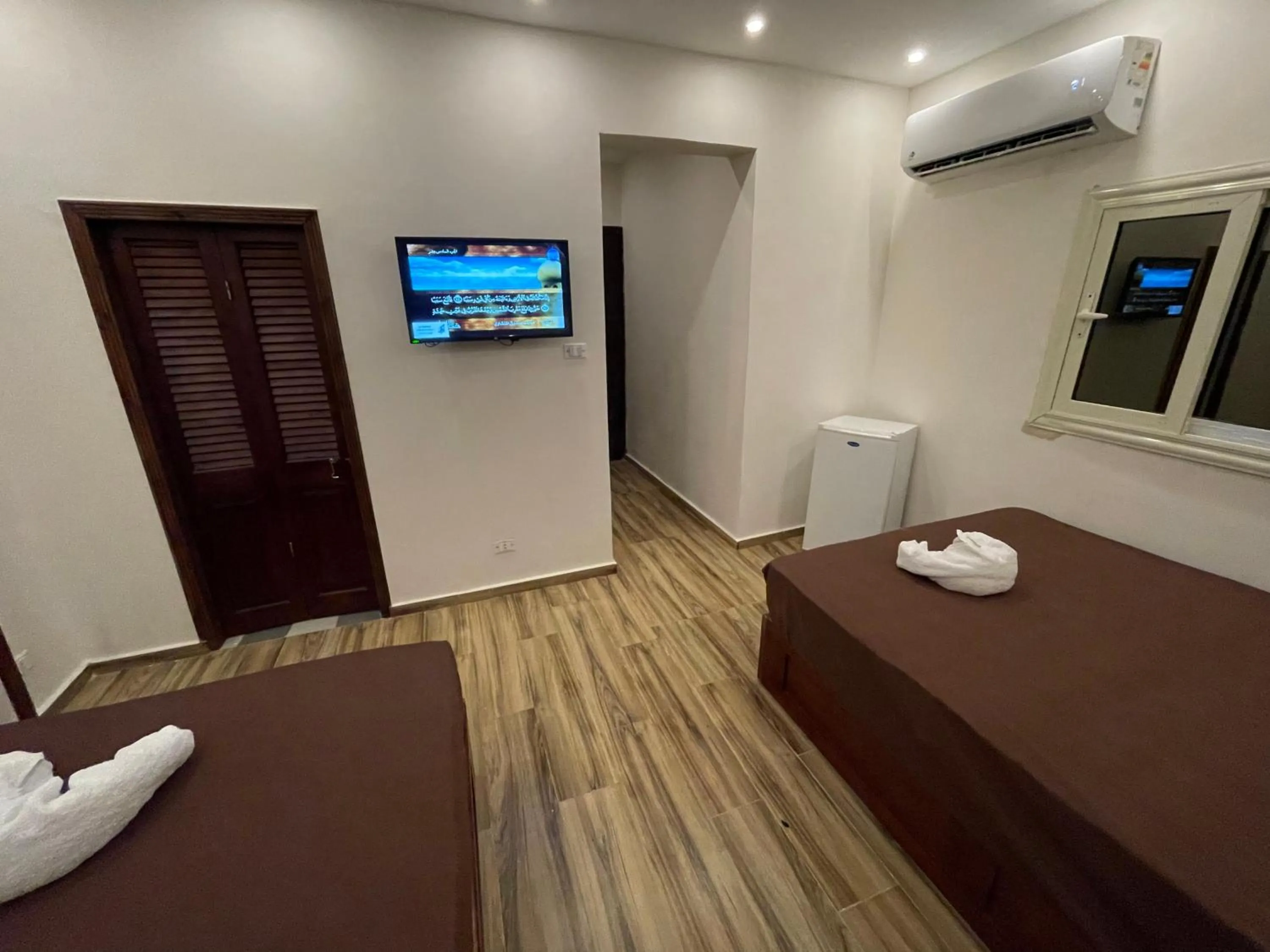 Bed in Sahara Pyramids Inn