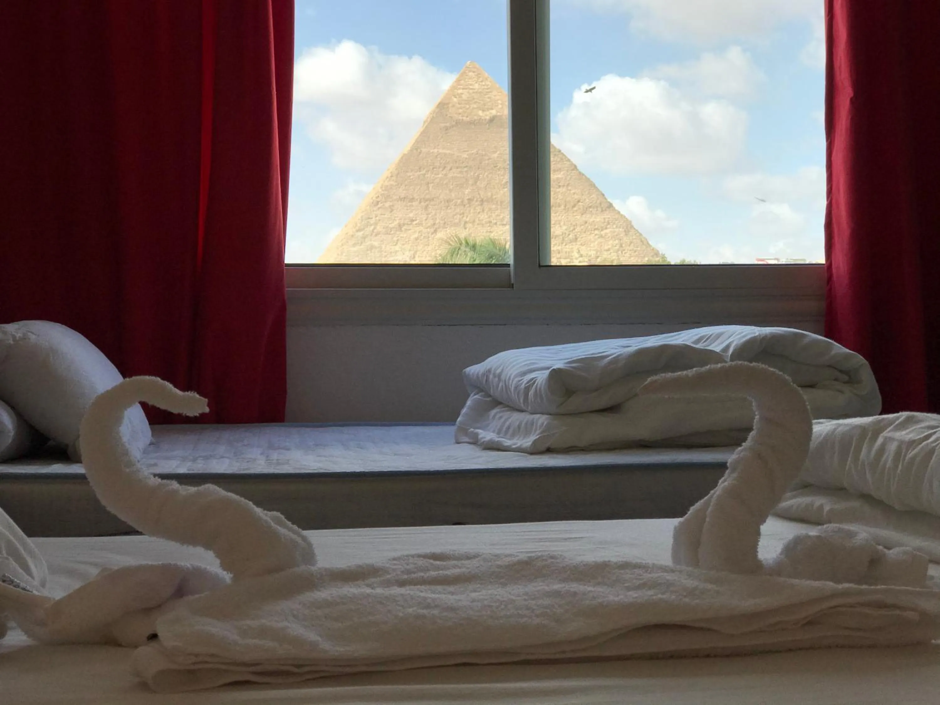 Bed in Sahara Pyramids Inn