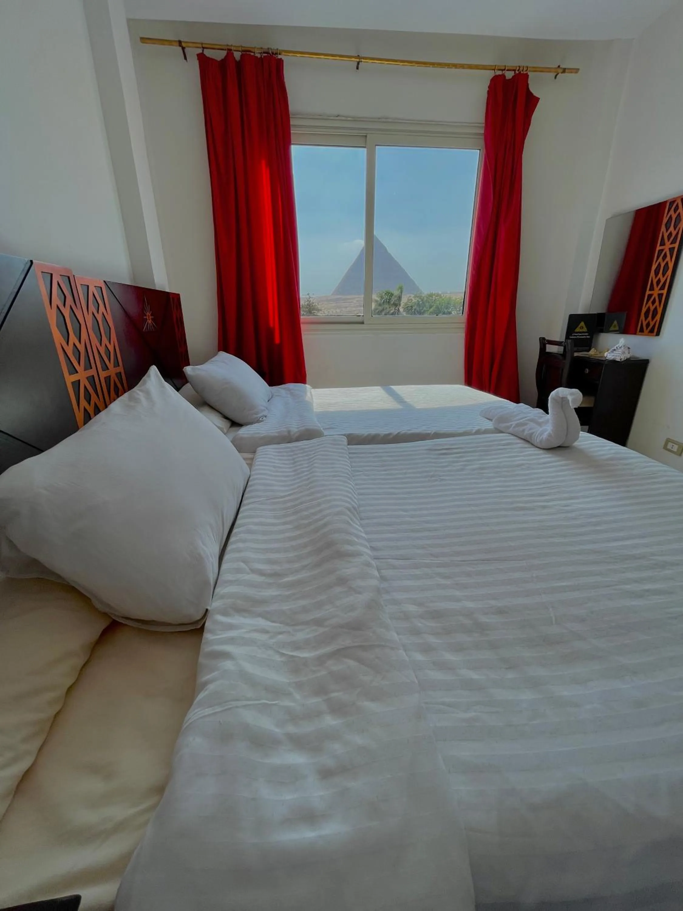 Bed in Sahara Pyramids Inn