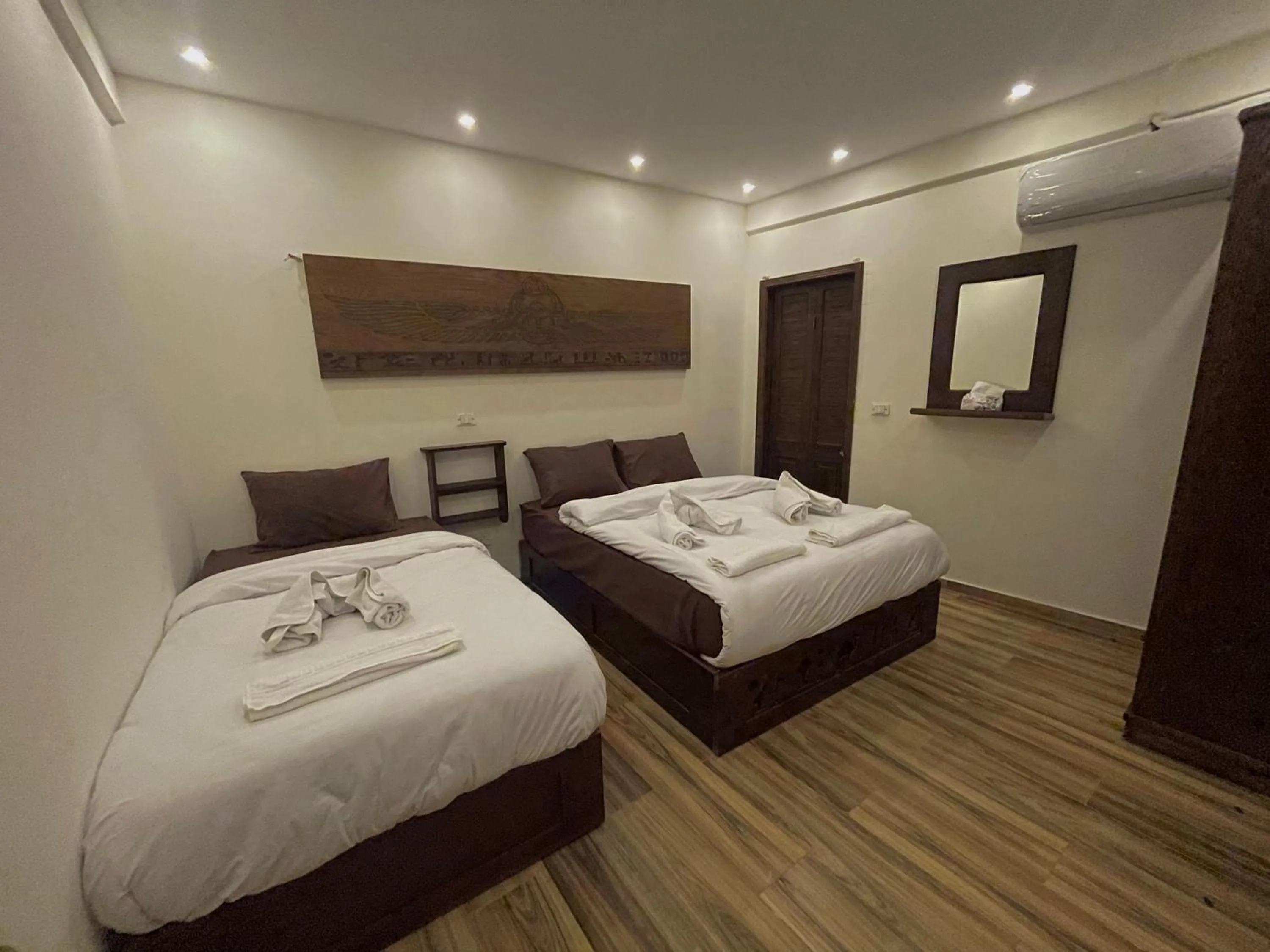 Bed in Sahara Pyramids Inn