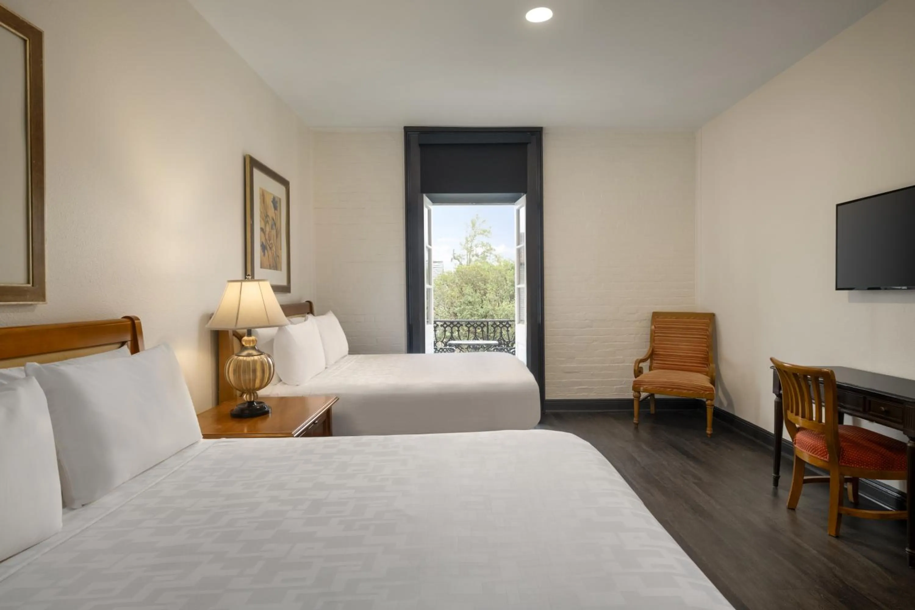 Bed in Le Richelieu Hotel in the French Quarter