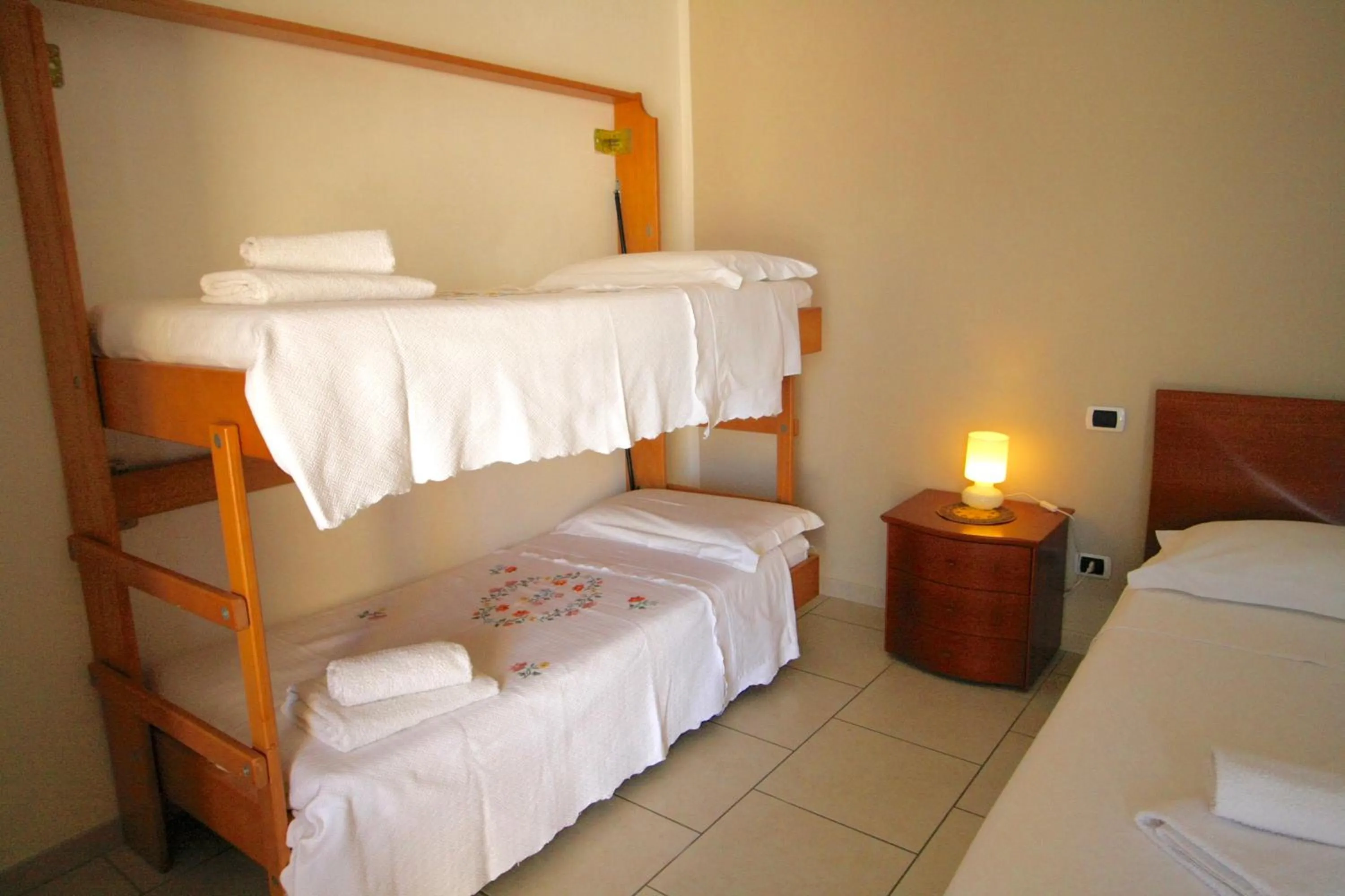 Bedroom in Giardino Dei Suoni B&B