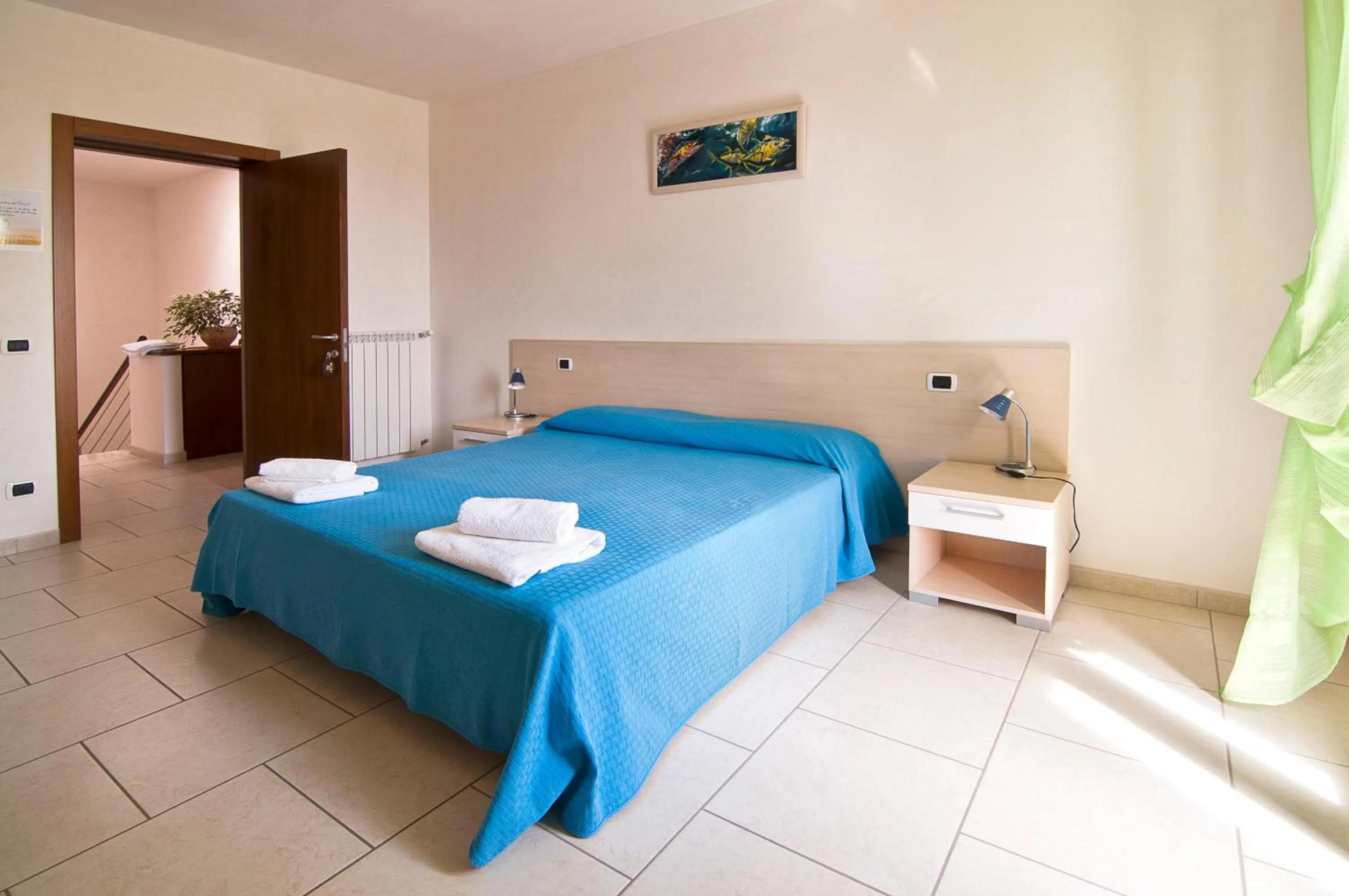 Bedroom in Giardino Dei Suoni B&B