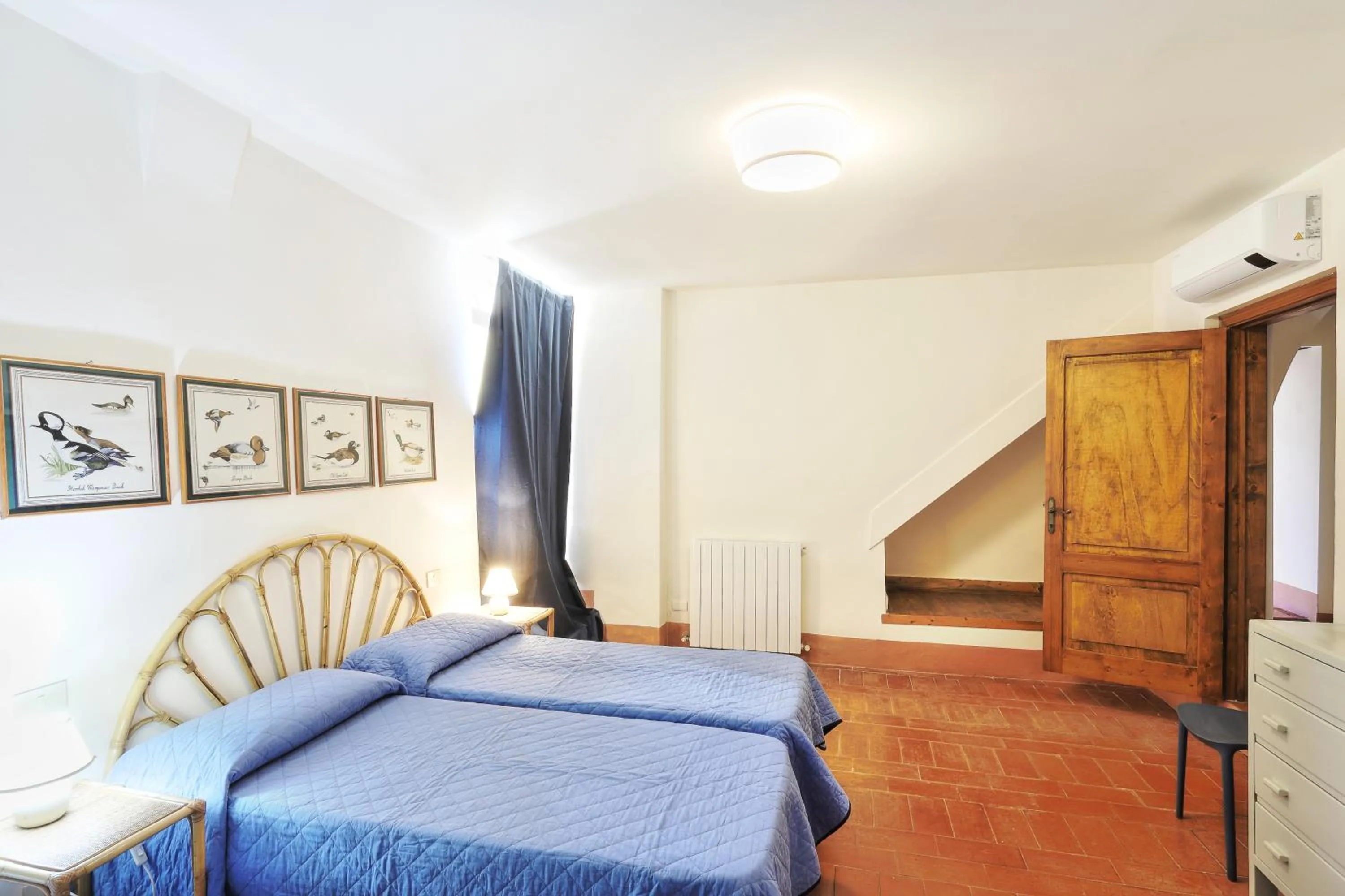 Bedroom, Bed in Appartamenti Villa e Fattoria di Radi Tuscany