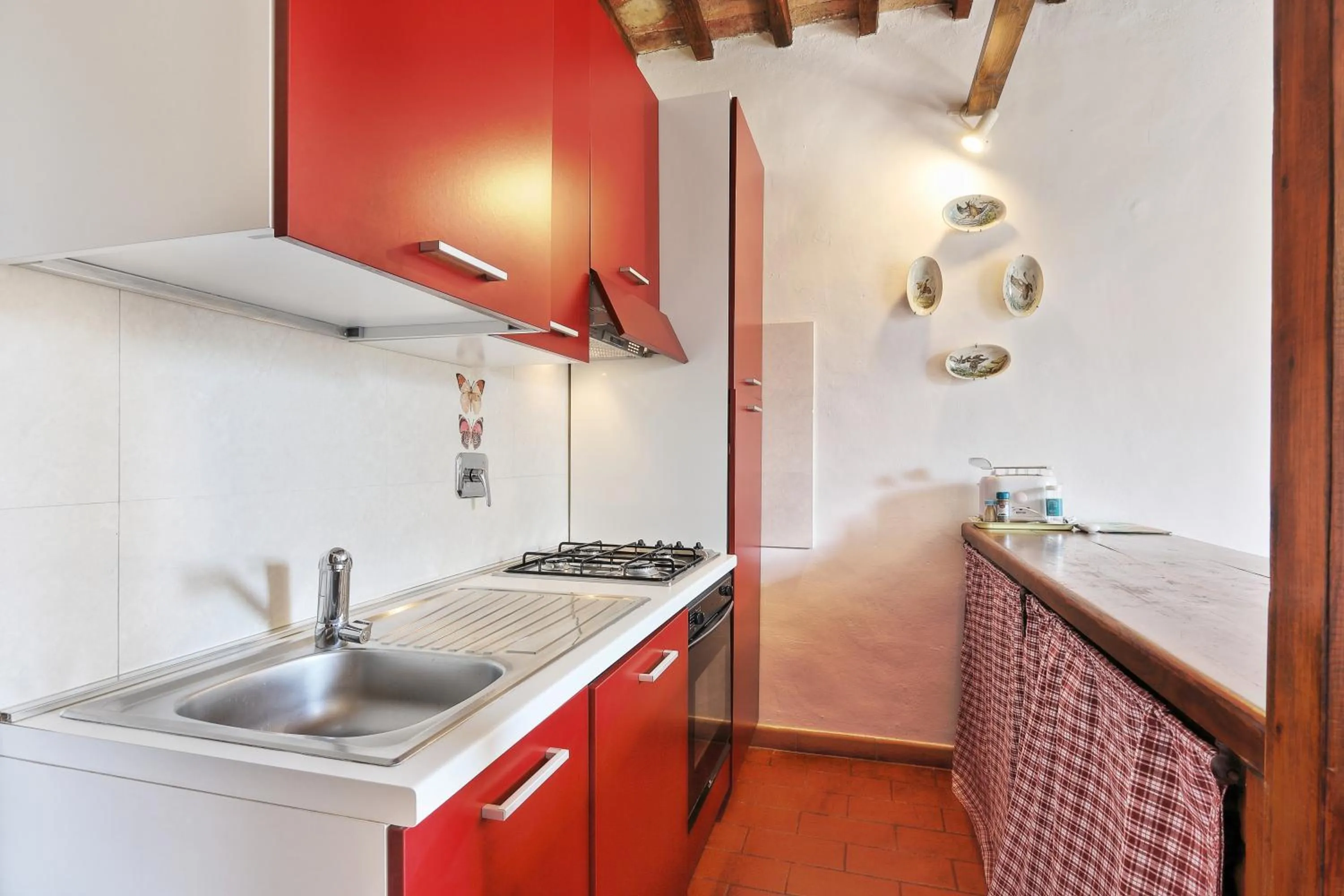 Kitchen or kitchenette in Appartamenti Villa e Fattoria di Radi Tuscany
