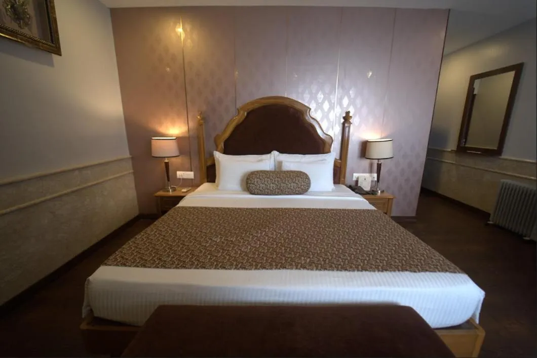 Bed in Hotel JSR Continental