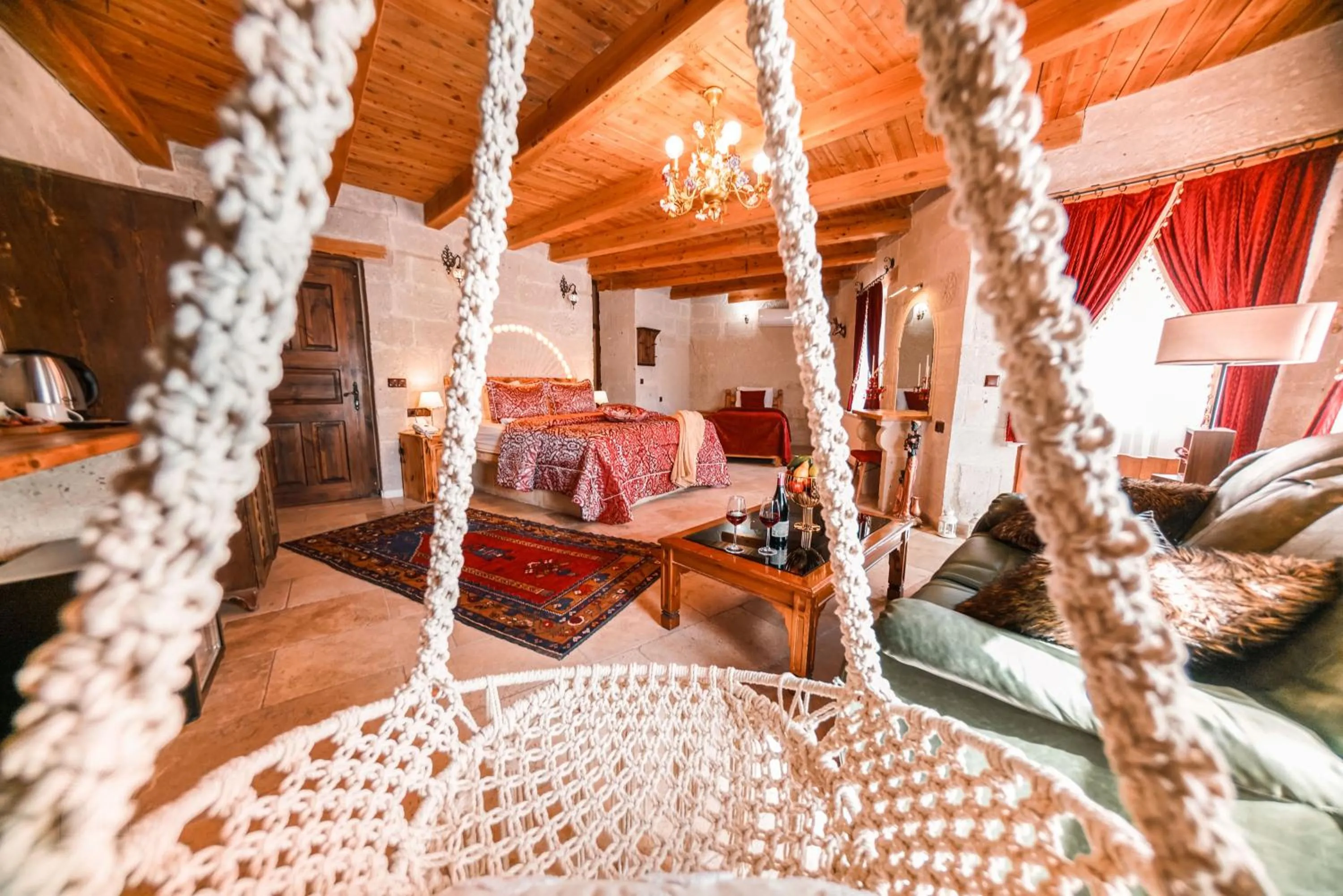 Photo of the whole room, Bed in Zeus Cave Suites