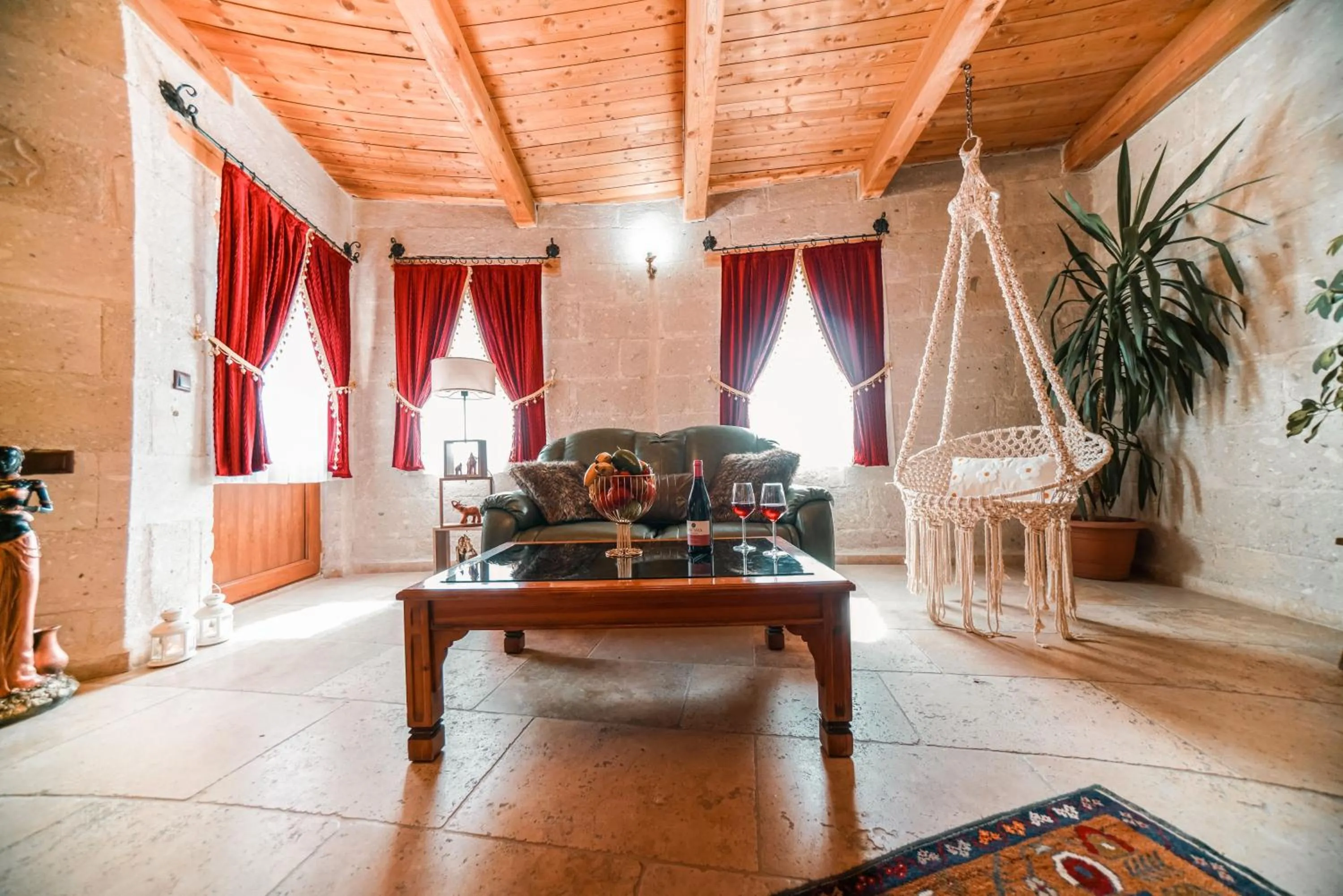 Seating area in Zeus Cave Suites