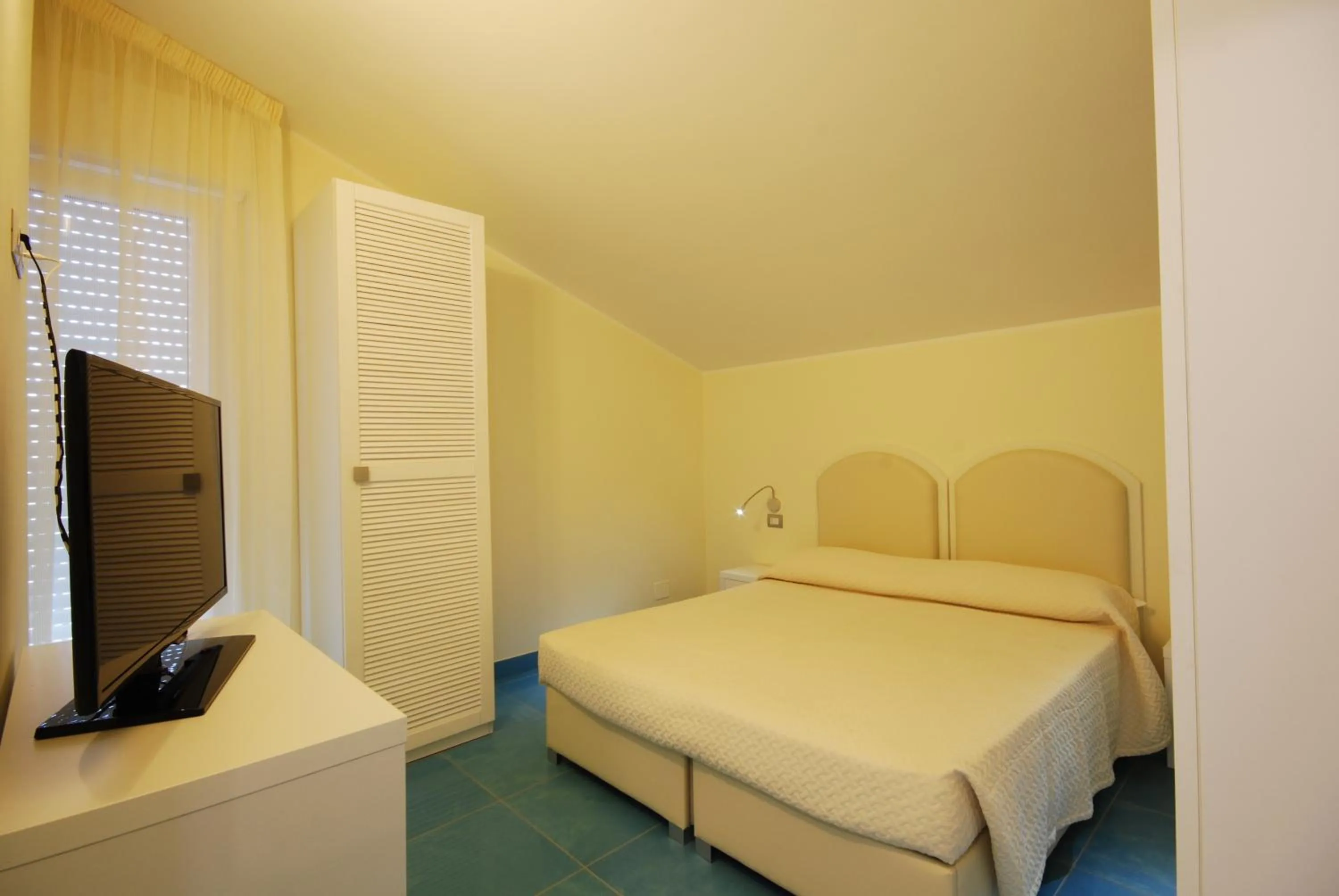 Bedroom, Bed in Residence Abruzzo Resort