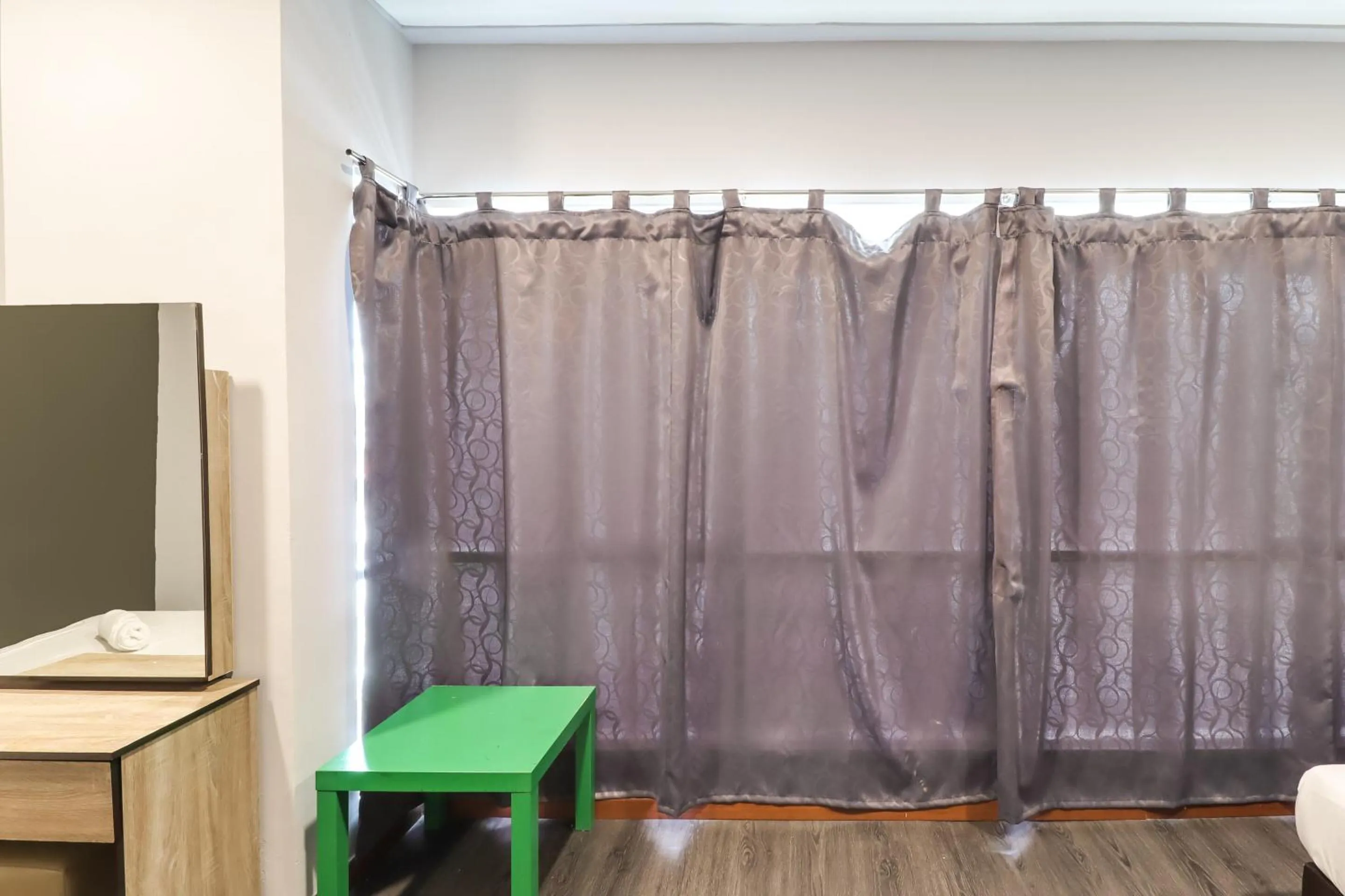 Bedroom in OYO 89381 Moonnight Hotel