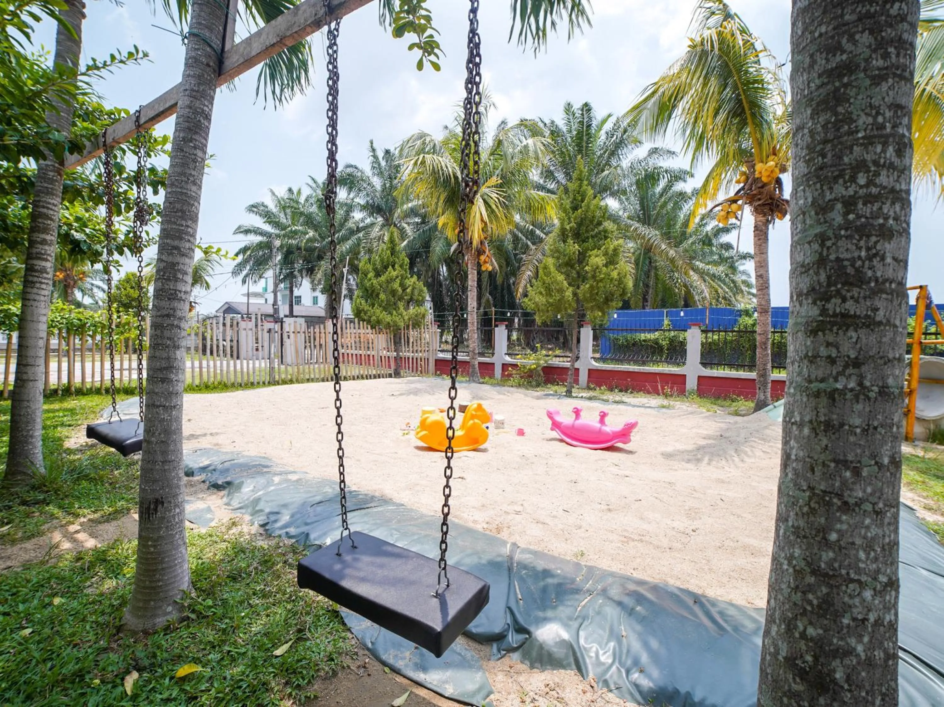 Children play ground in Capital O 89374 Ohana Restaurant & Homestay