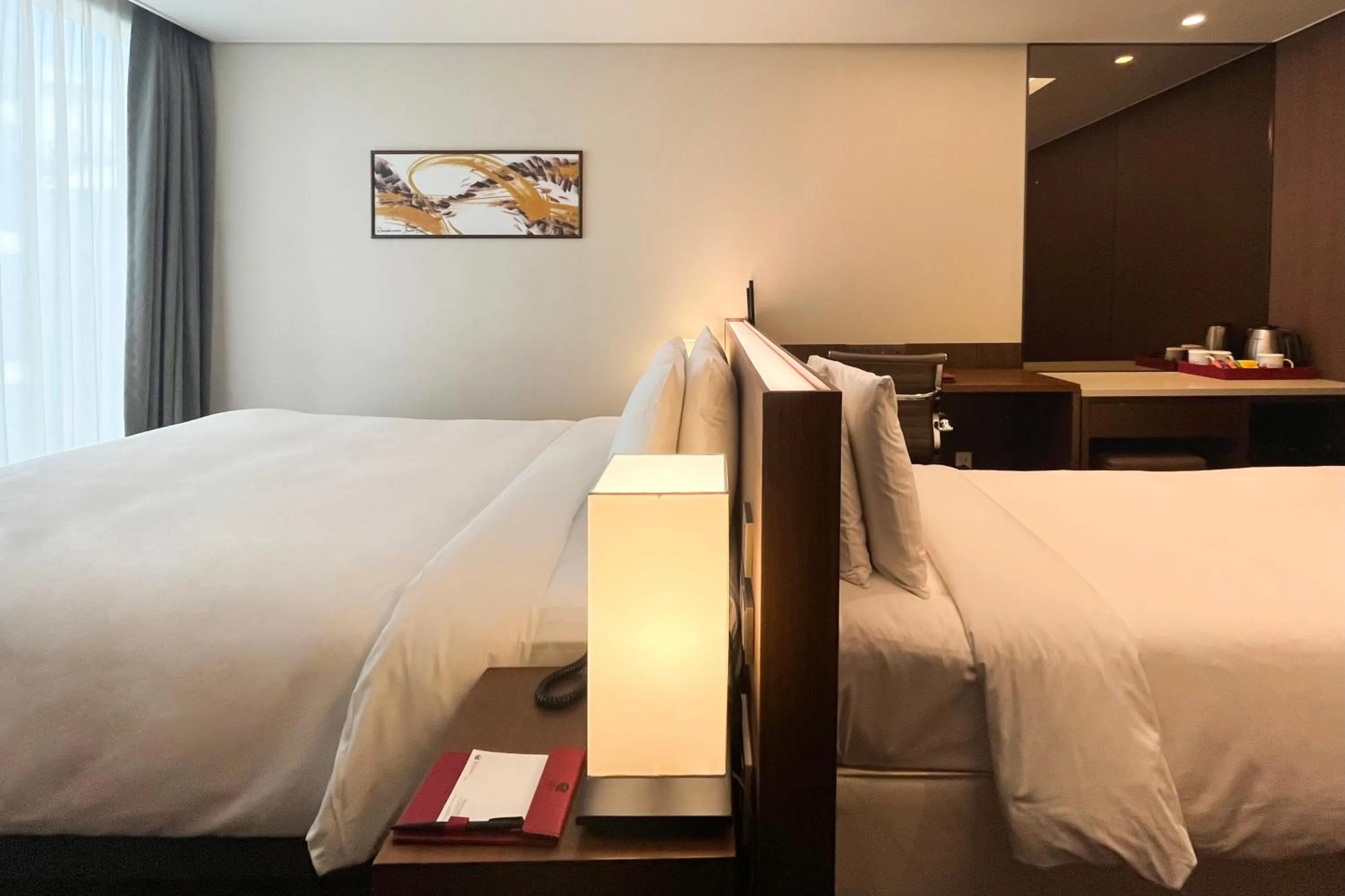 Bed in Ramada Encore by Wyndham Busan Station