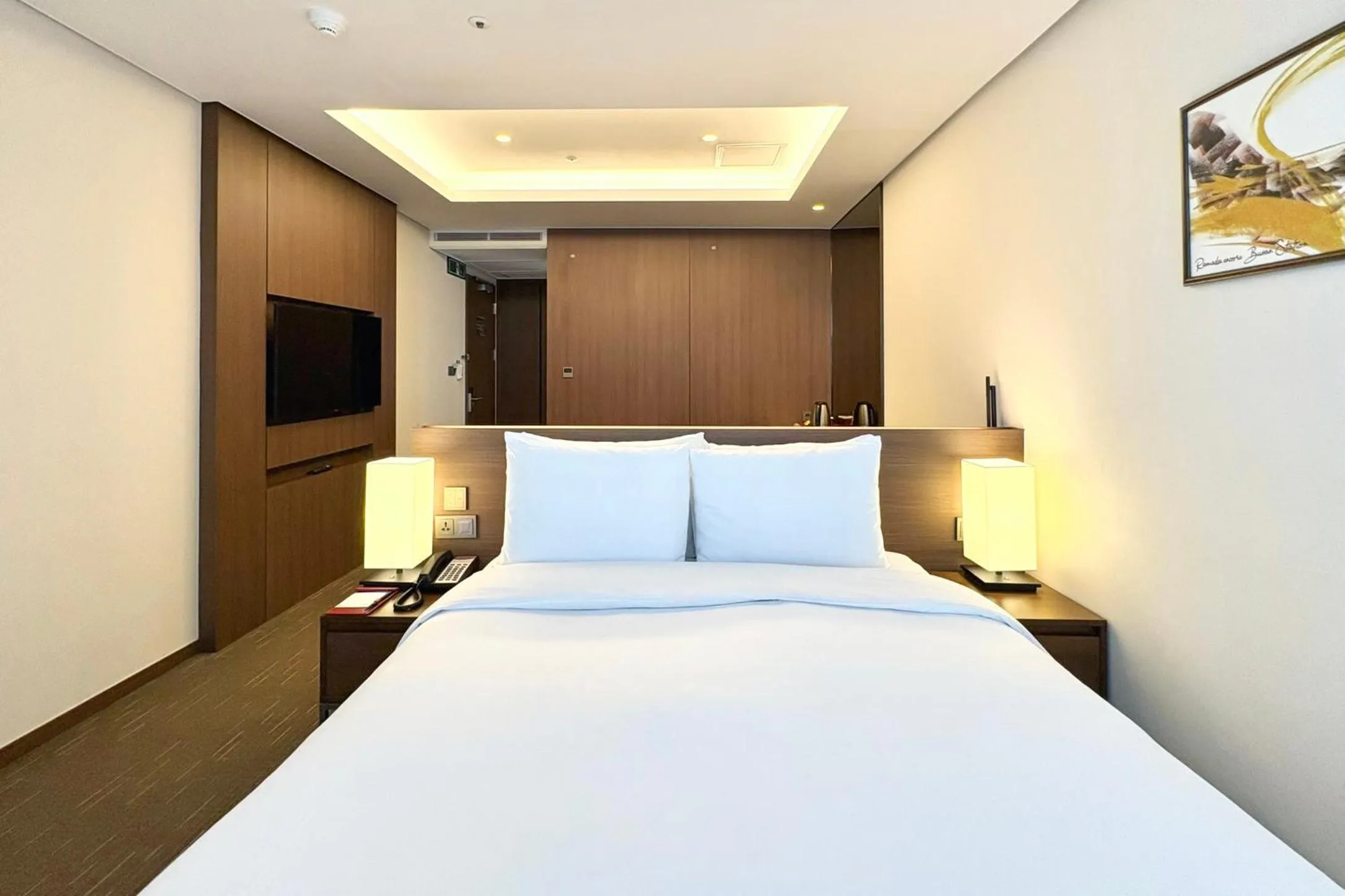 Bed in Ramada Encore by Wyndham Busan Station