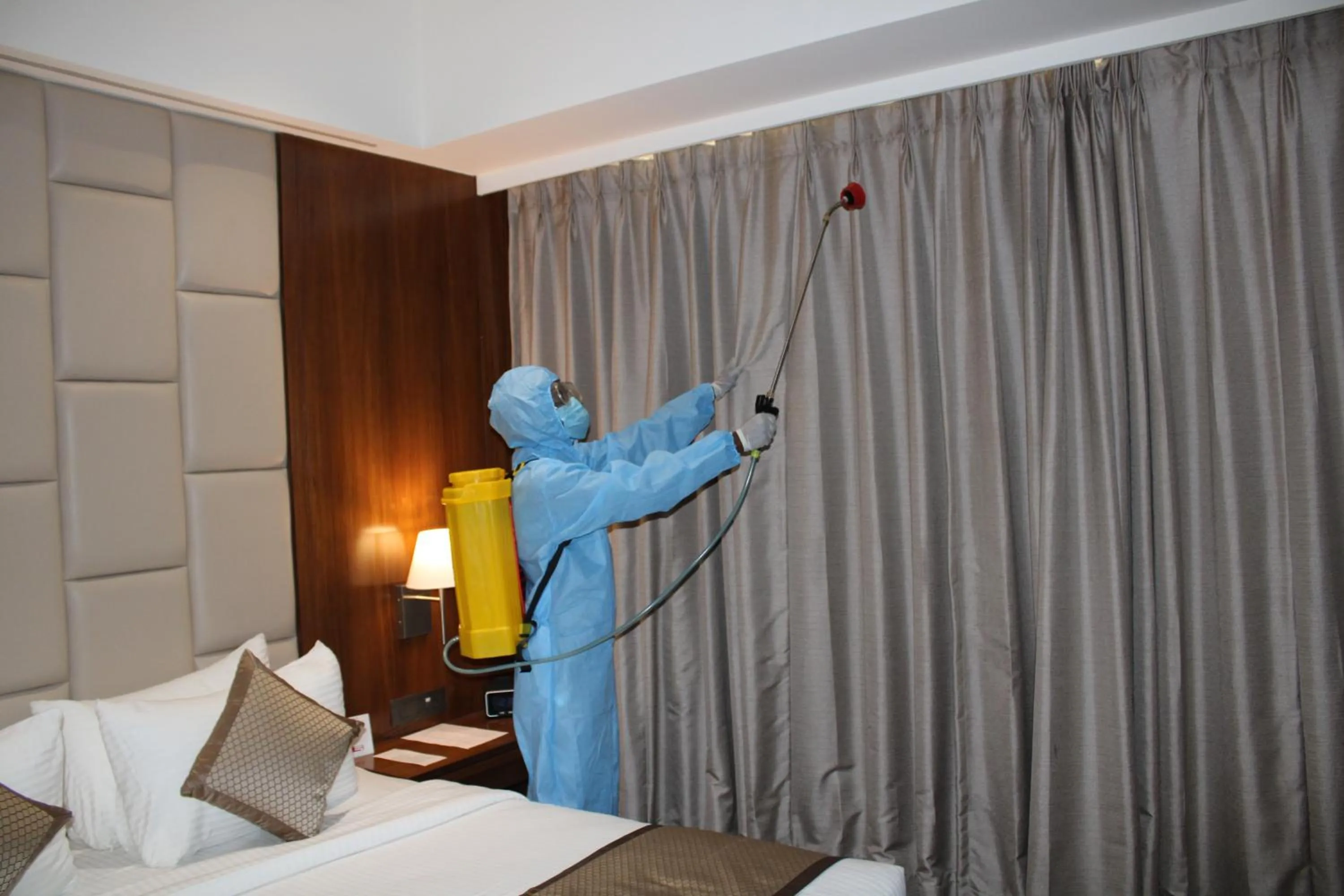 People, Bed in Ramada by Wyndham Gandhidham Shinay