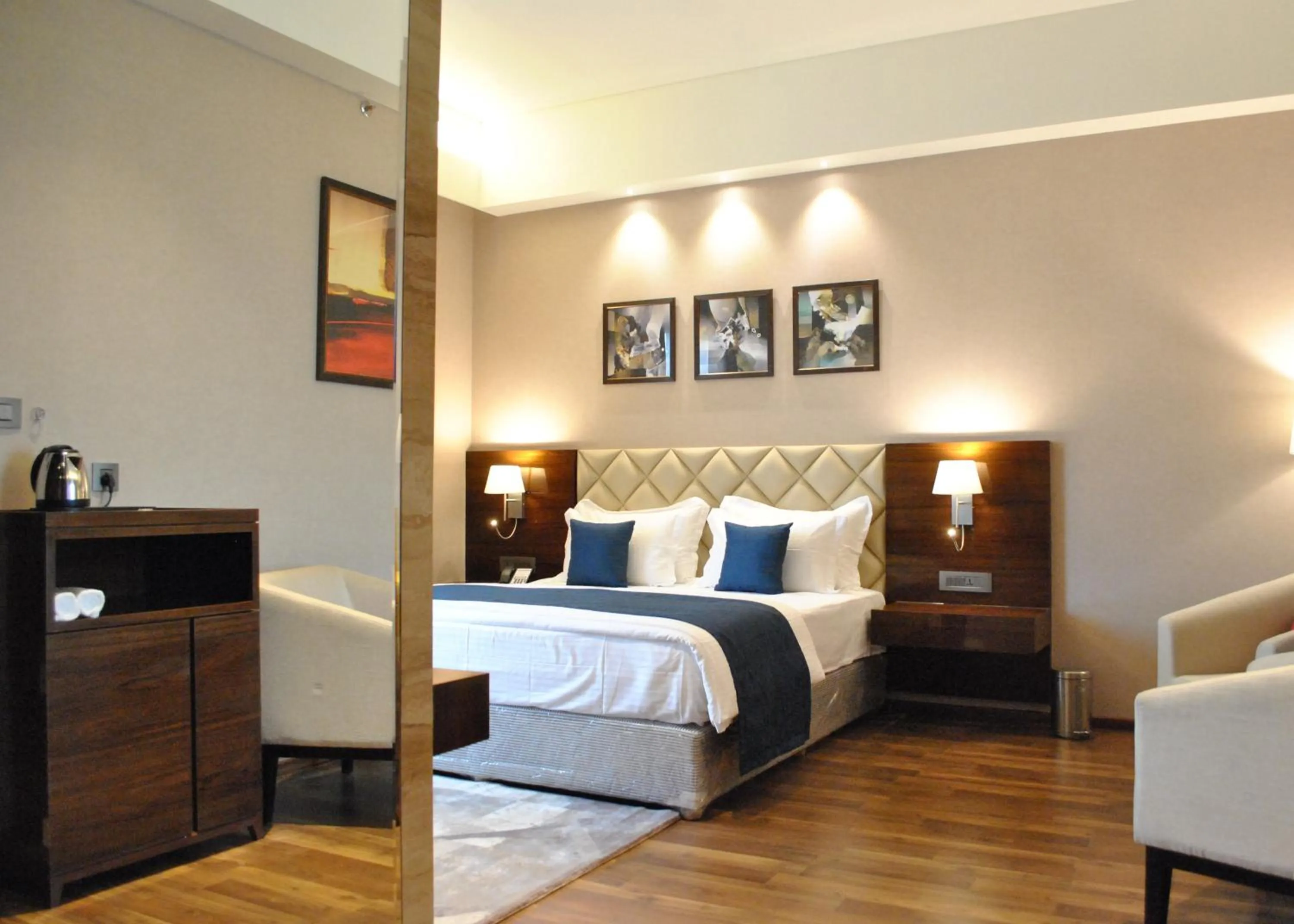Bedroom, Bed in Ramada by Wyndham Gandhidham Shinay