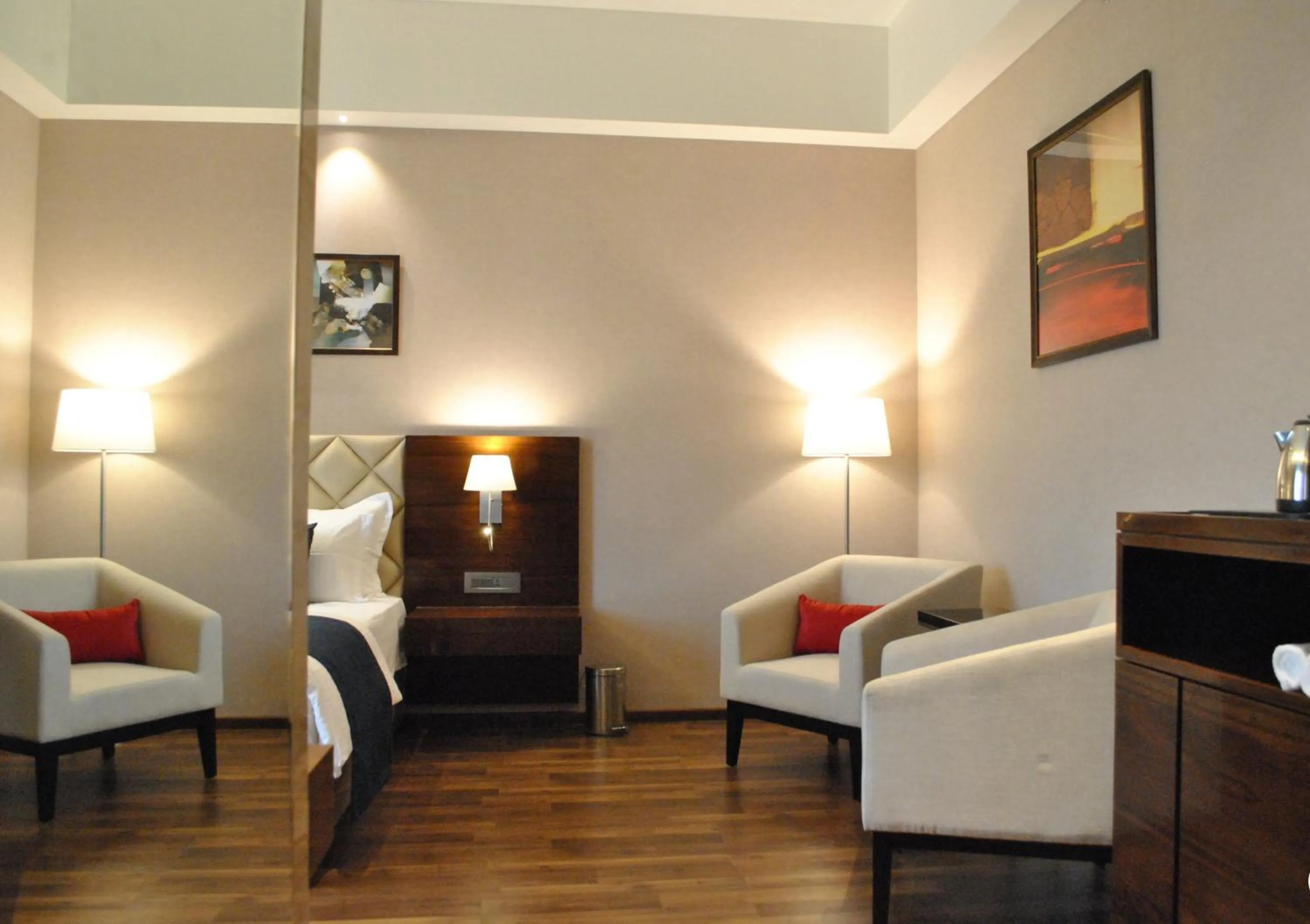 Seating area in Ramada by Wyndham Gandhidham Shinay