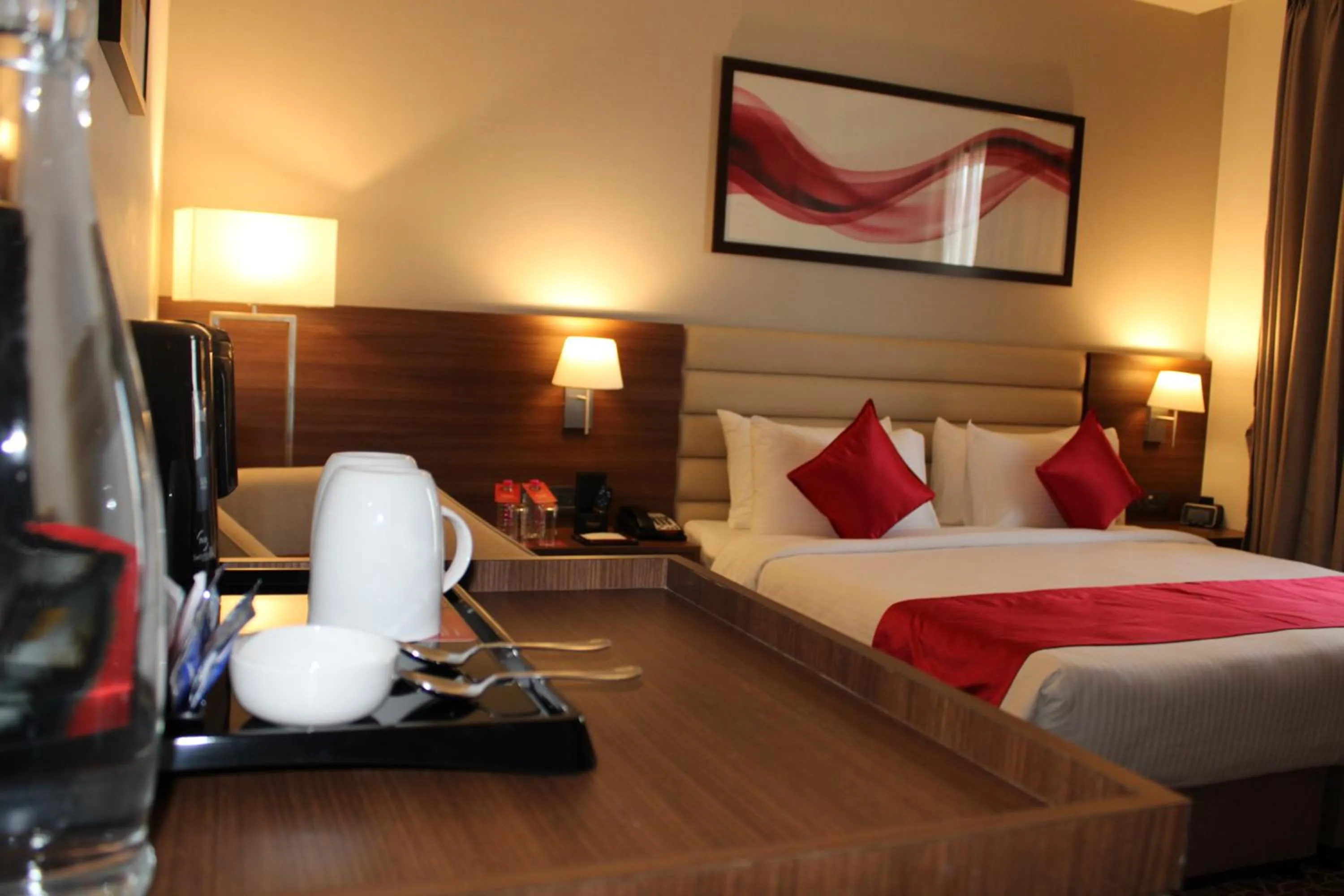 Bedroom, Bed in Ramada by Wyndham Gandhidham Shinay