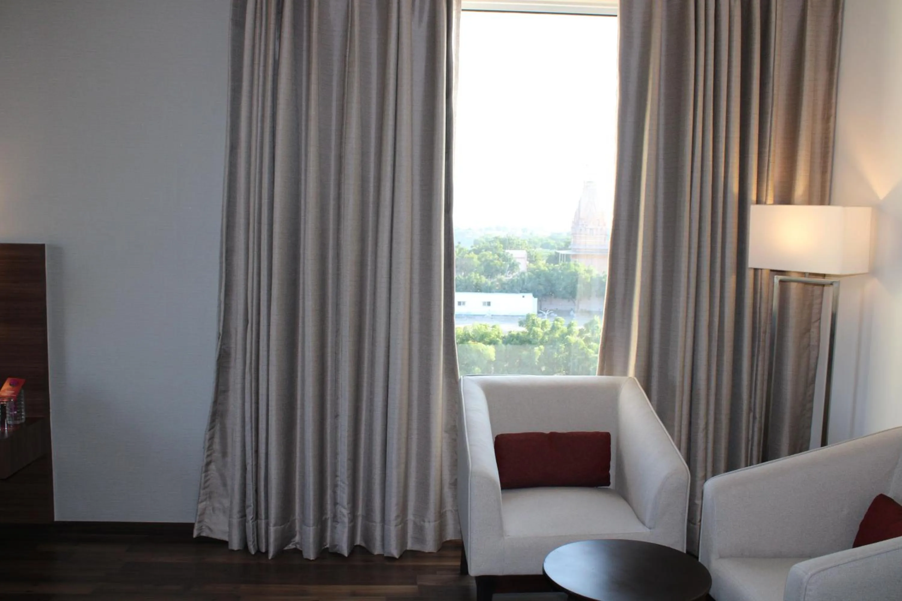 Seating area in Ramada by Wyndham Gandhidham Shinay