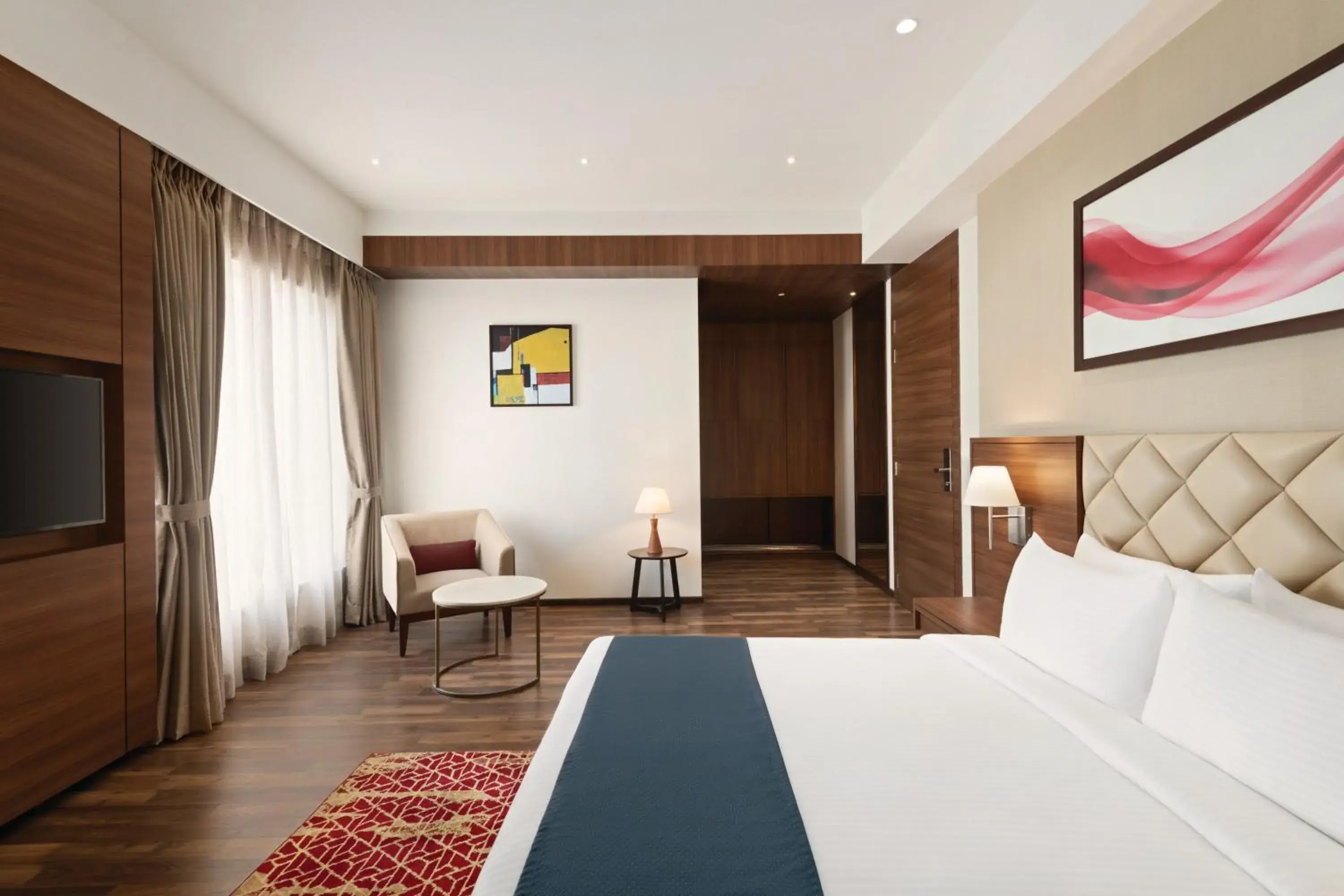Deluxe Twin Room (Non-Smoking) - single occupancy - Book & Unlock Exclusive Discounts in Ramada by Wyndham Gandhidham Shinay Deluxe Twin Room (Non-Smoking) - single occupancy - Book & Unlock Exclusive Discounts in Ramada by Wyndham Gandhidham Shinay