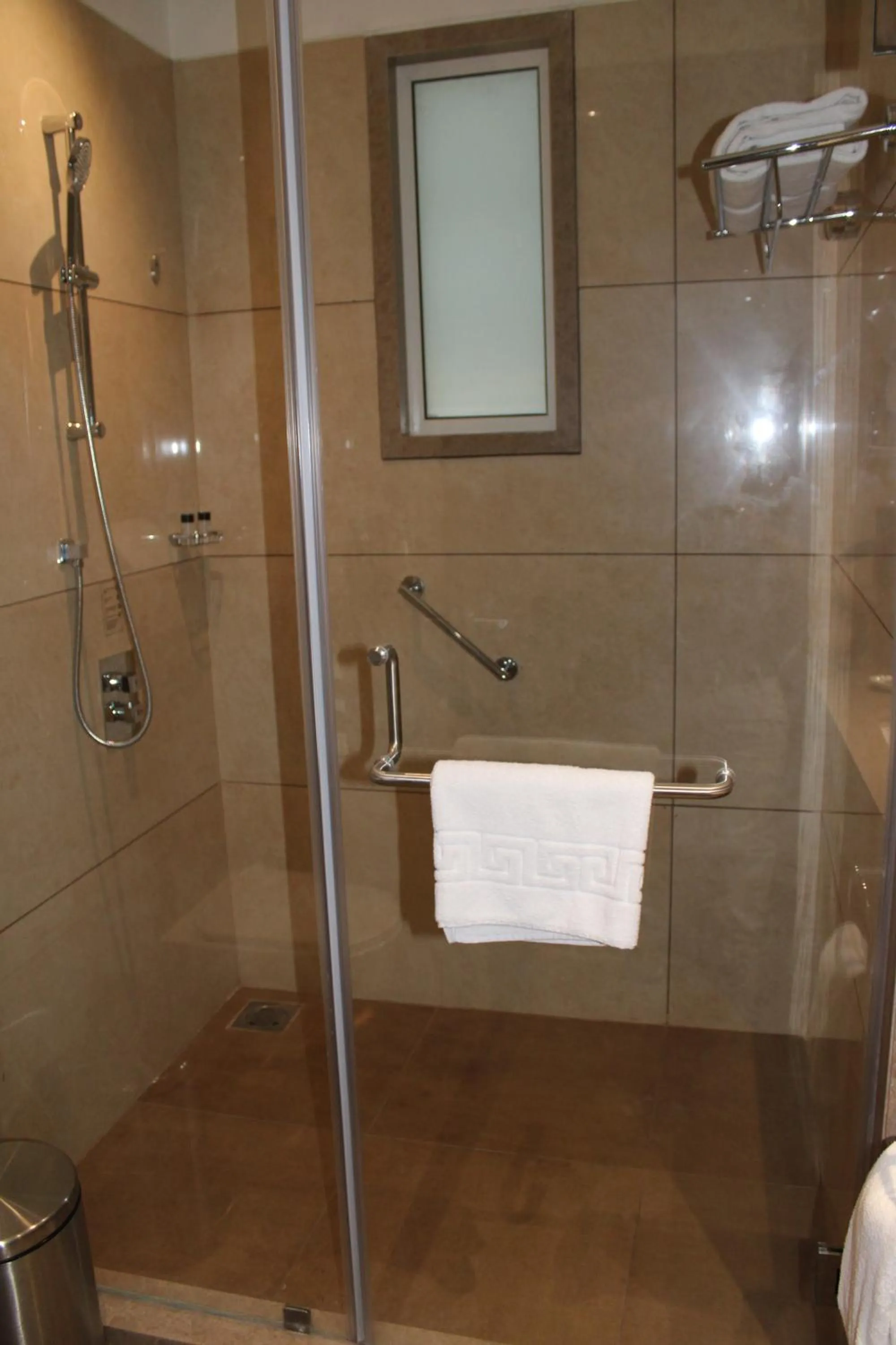 Shower in Ramada by Wyndham Gandhidham Shinay