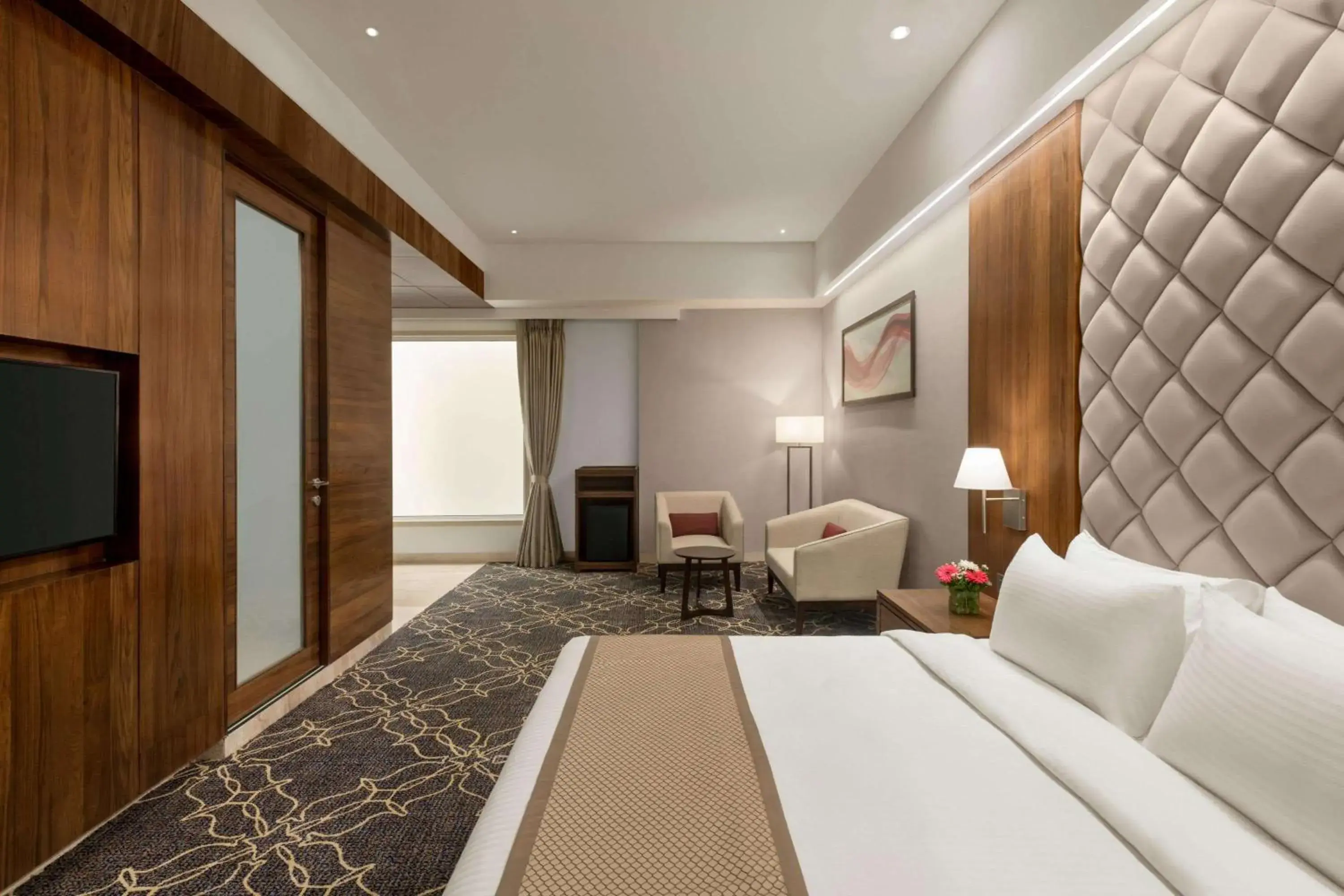 Photo of the whole room, Bed in Ramada by Wyndham Gandhidham Shinay Photo of the whole room, Bed in Ramada by Wyndham Gandhidham Shinay