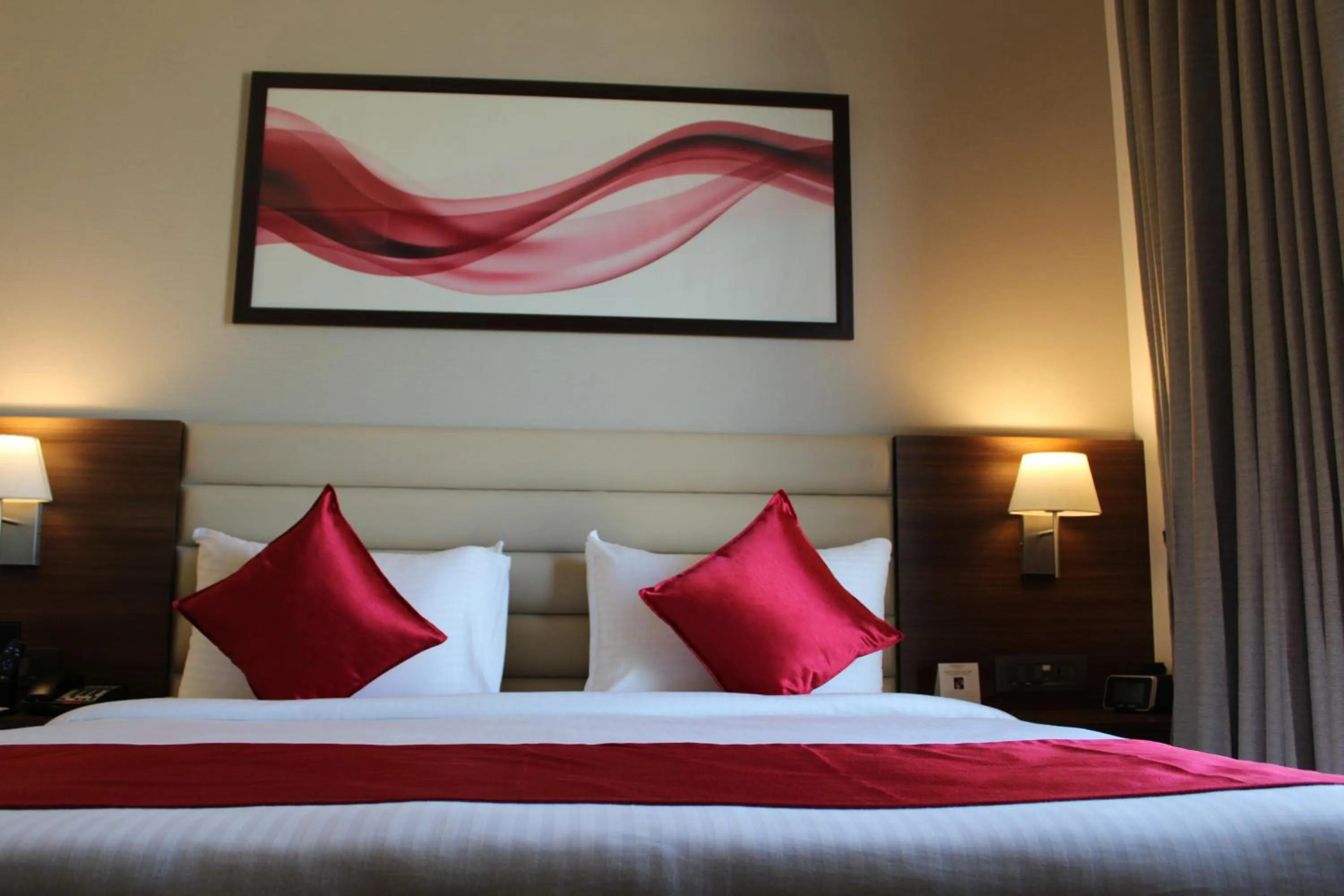 Bedroom, Bed in Ramada by Wyndham Gandhidham Shinay