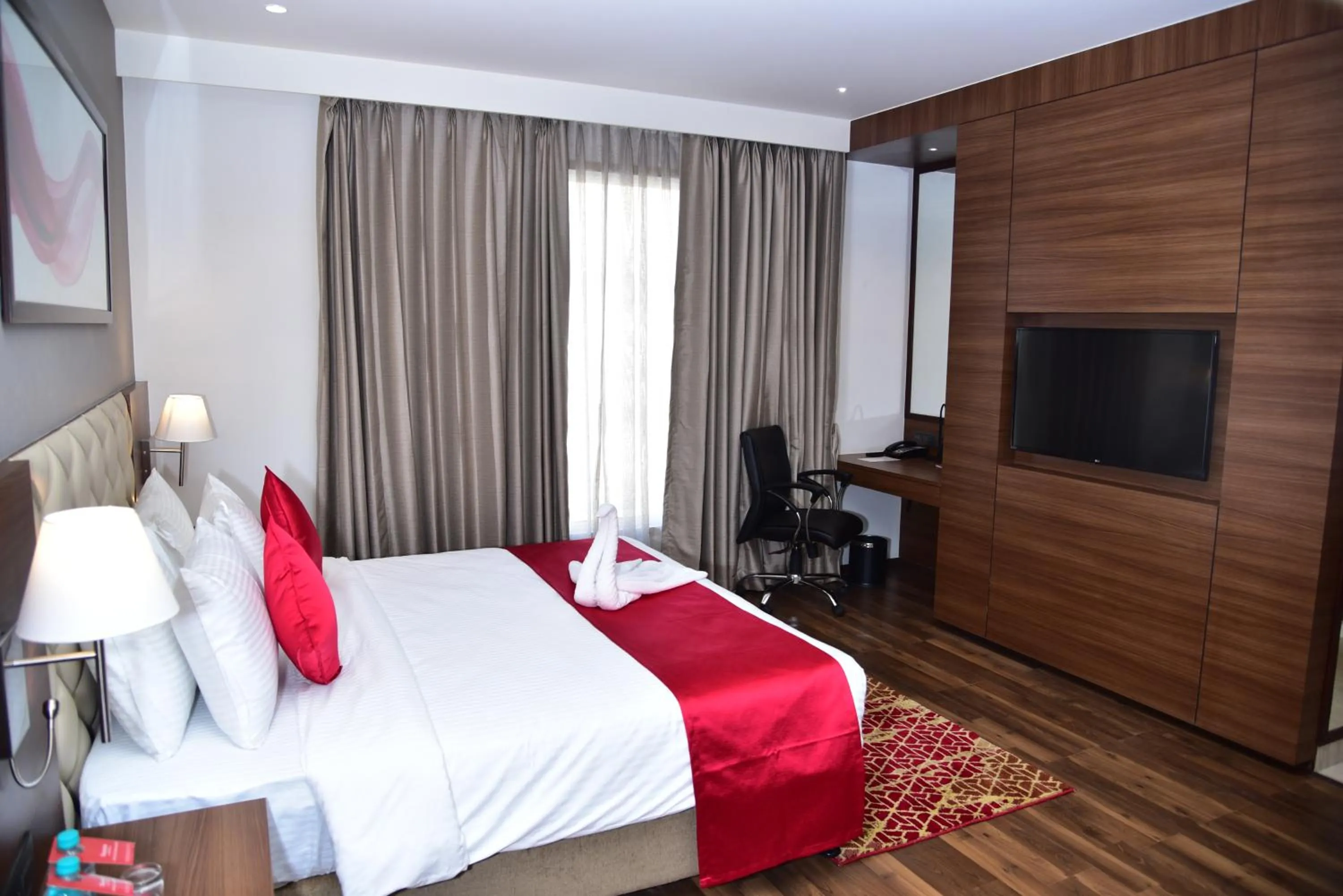 Bedroom, Bed in Ramada by Wyndham Gandhidham Shinay