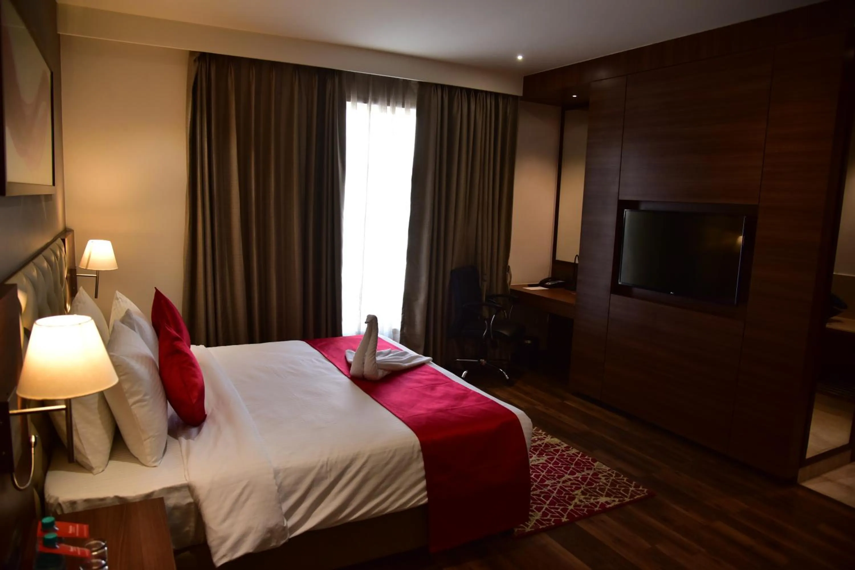 Bedroom, Bed in Ramada by Wyndham Gandhidham Shinay
