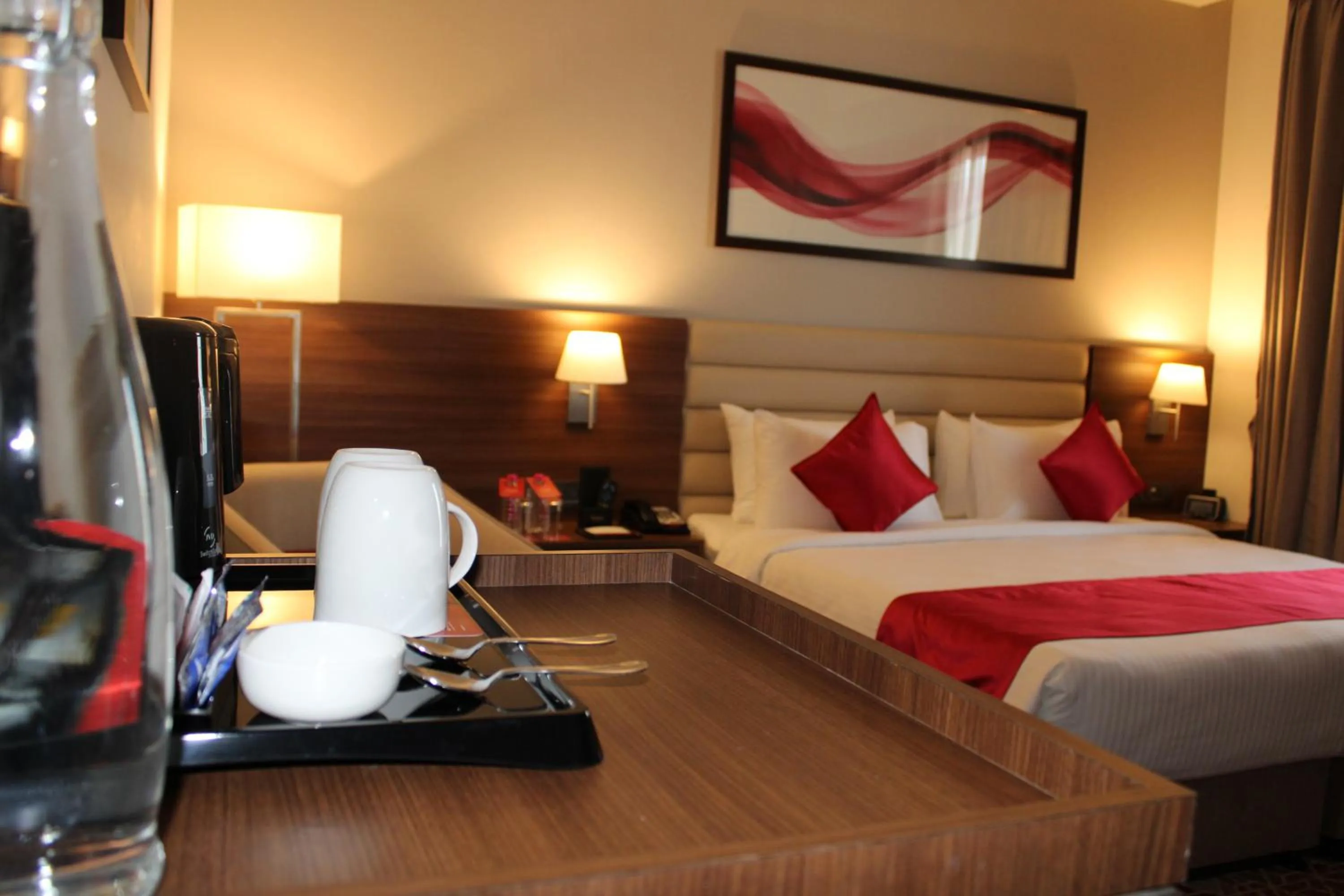 Bedroom, Bed in Ramada by Wyndham Gandhidham Shinay