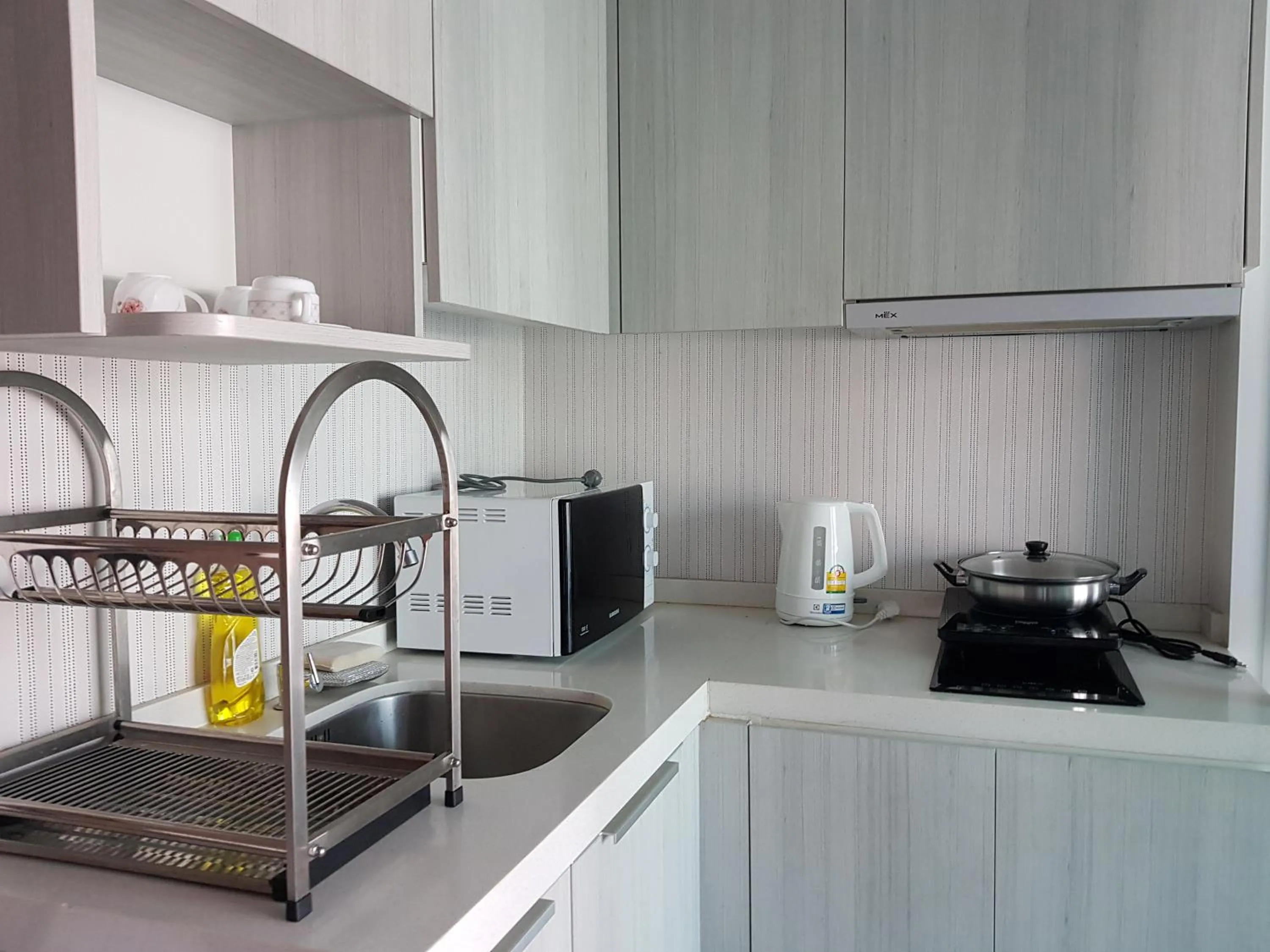Kitchen or kitchenette in The Prio Signature Condo Chiangmai
