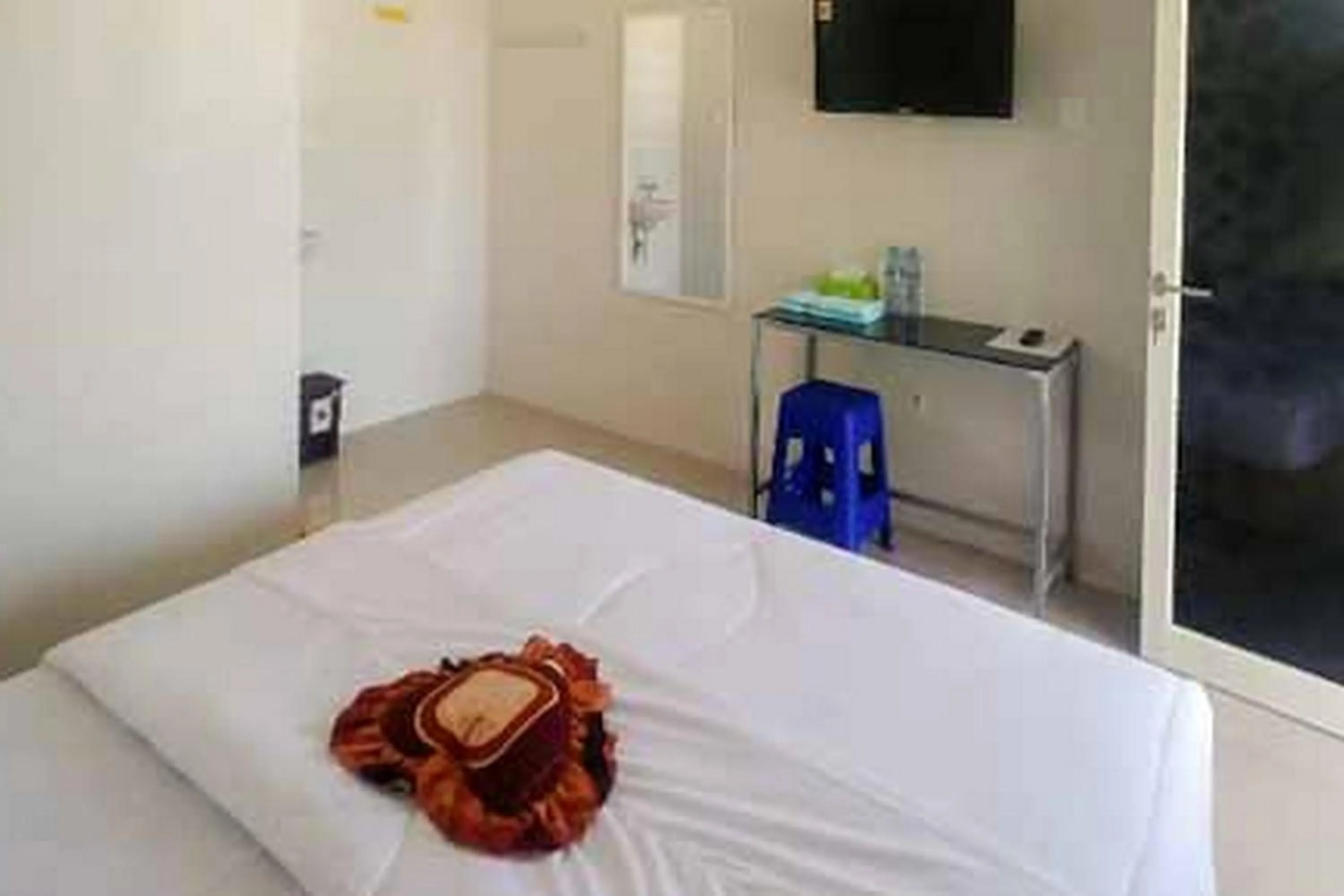 Bedroom, Bed in Griya Mulya near Alun Alun Batu Mitra RedDoorz