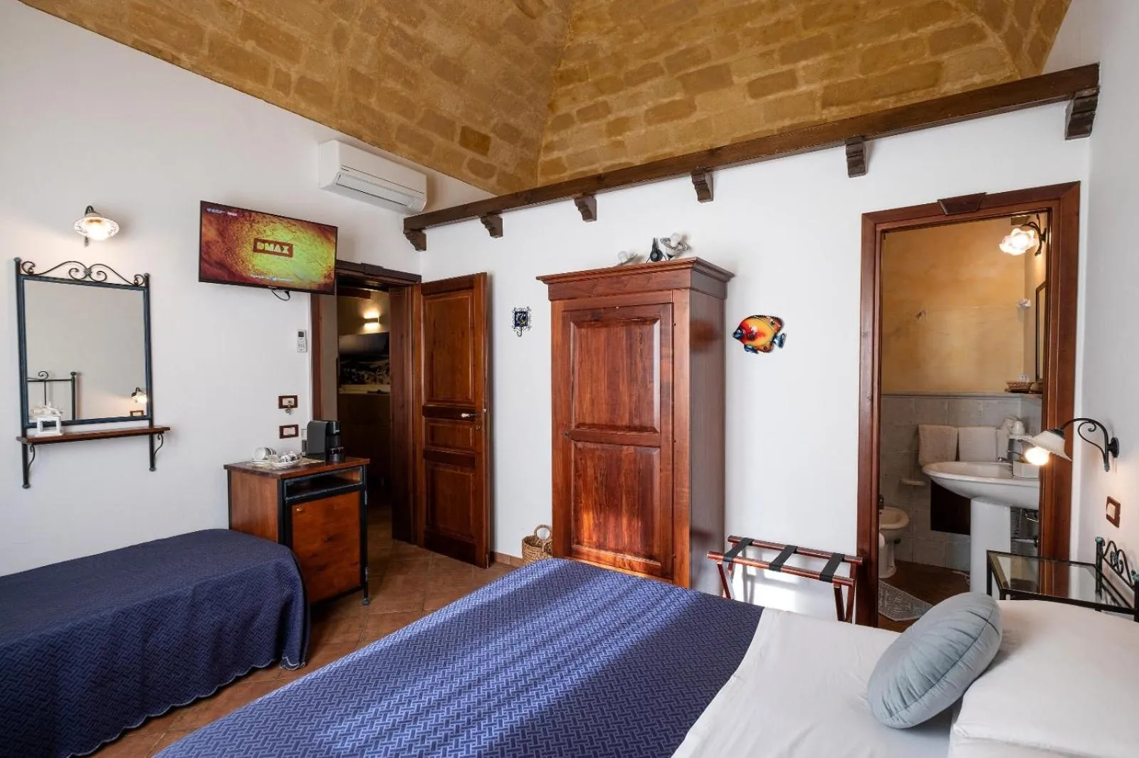 Bed in Ai Dammusi Rooms