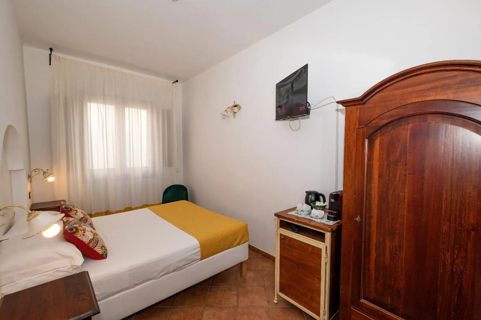 Bed in Ai Dammusi Rooms