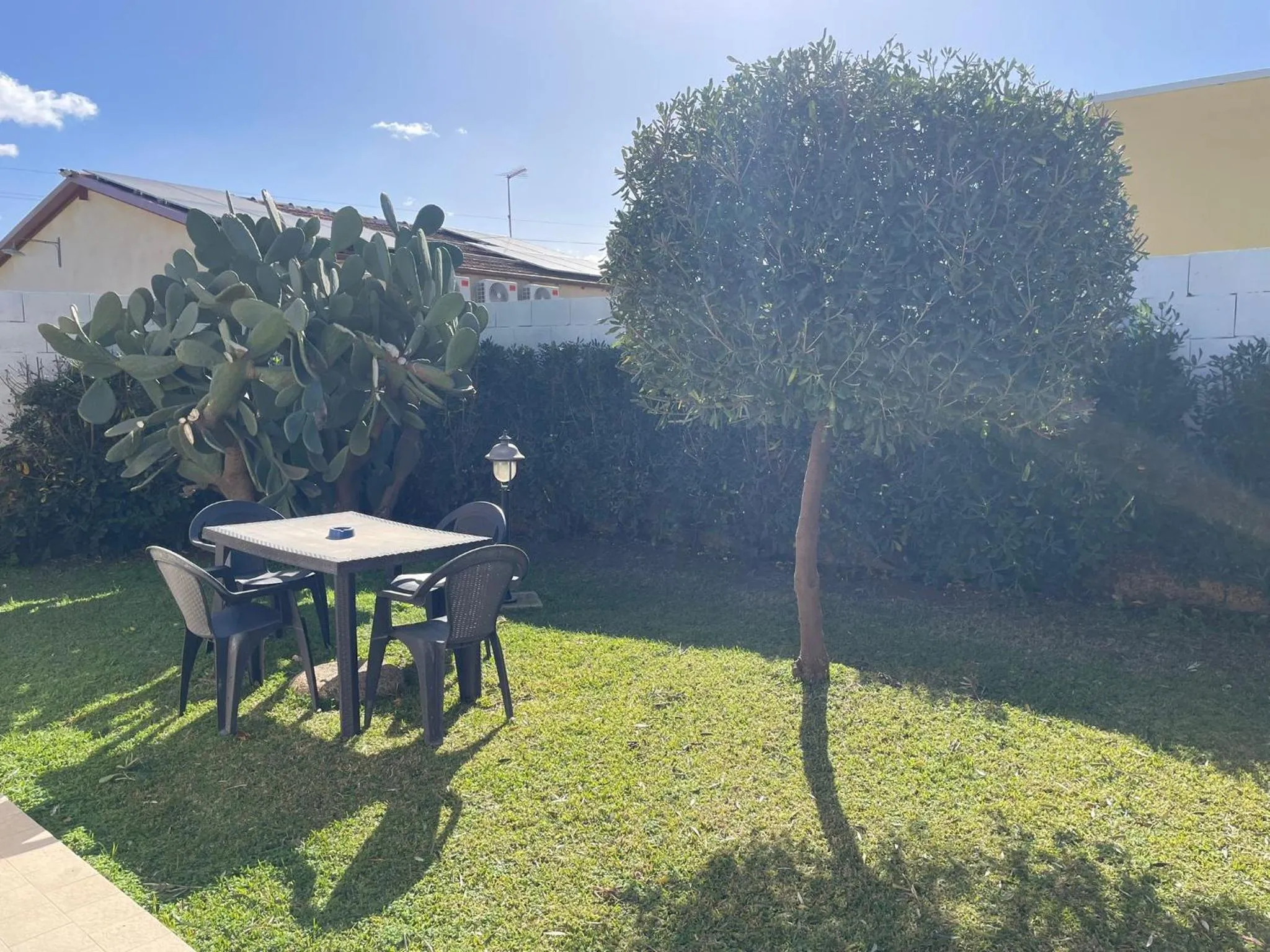 Garden view in Le Case Al Quadrato Residence