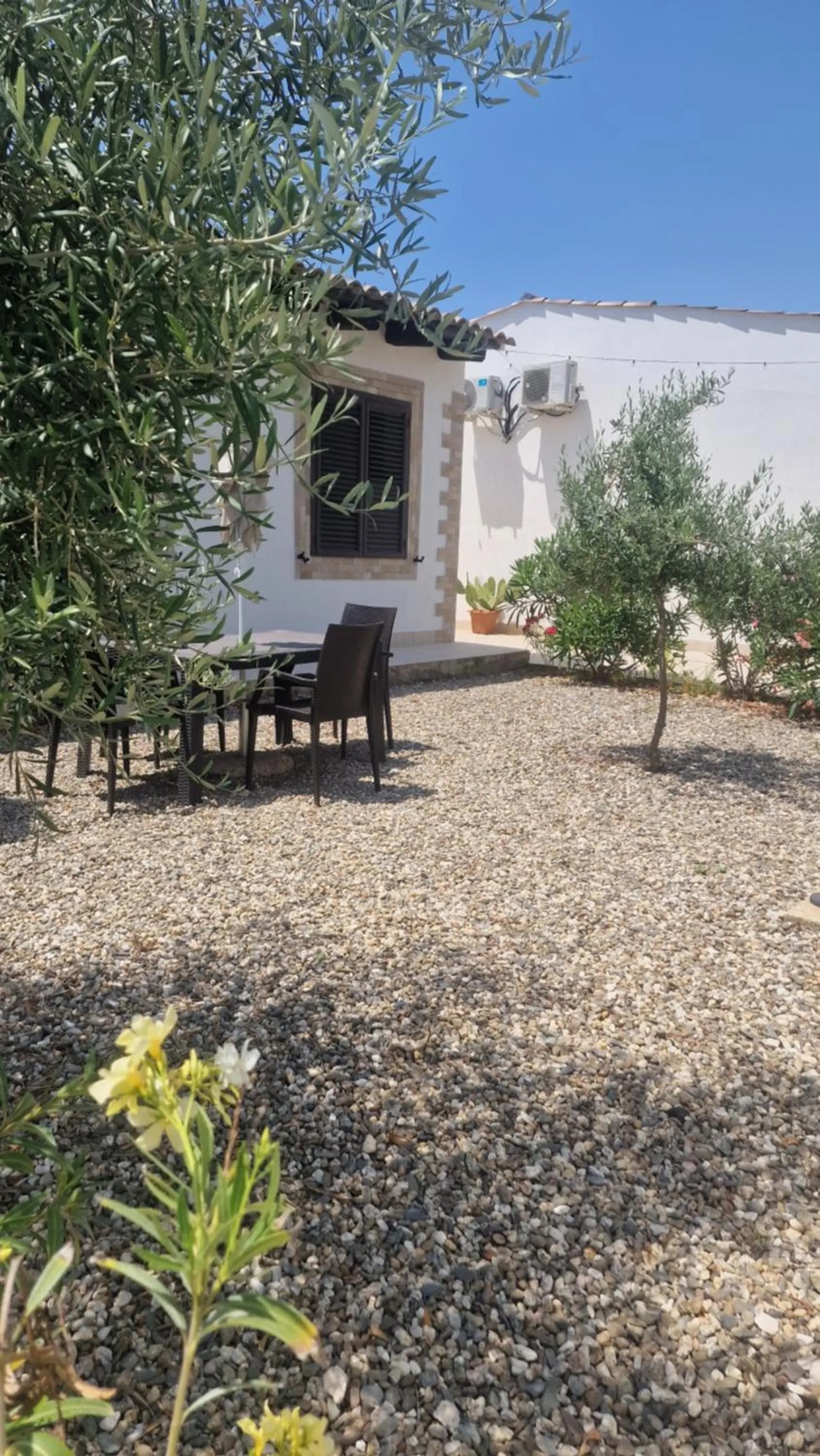 Garden view in Le Case Al Quadrato Residence