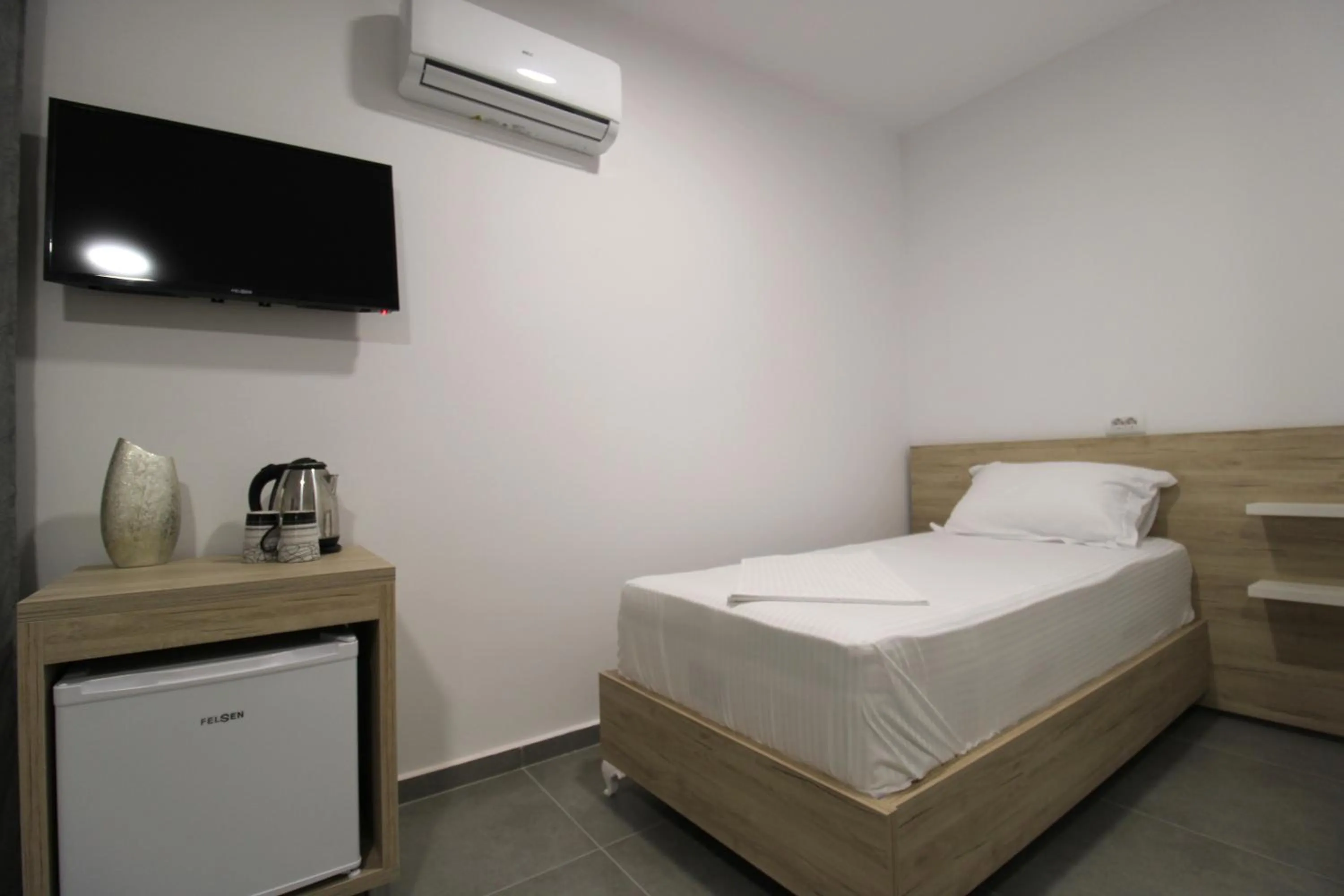 Bed in Hotel Villa Adrian
