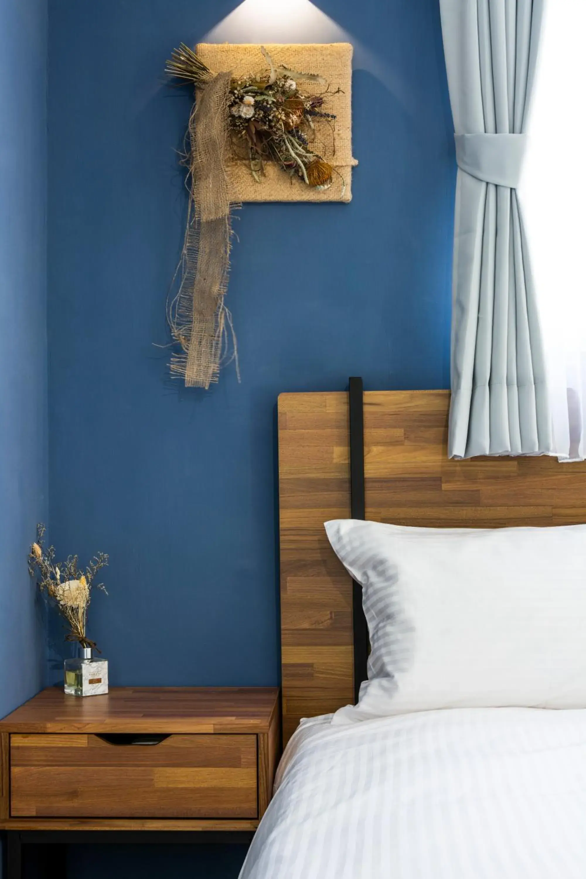 Bed in 沐藍輕旅 Mulan Light Inn I 海安路住宿 Bed in 沐藍輕旅 Mulan Light Inn I 海安路住宿