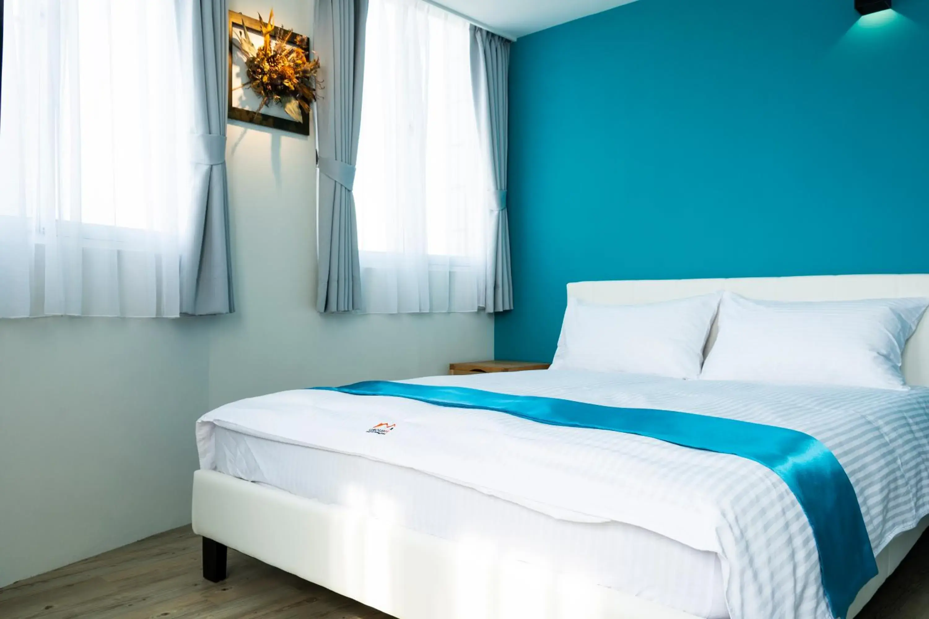 Bed in 沐藍輕旅 Mulan Light Inn I 海安路住宿 Bed in 沐藍輕旅 Mulan Light Inn I 海安路住宿