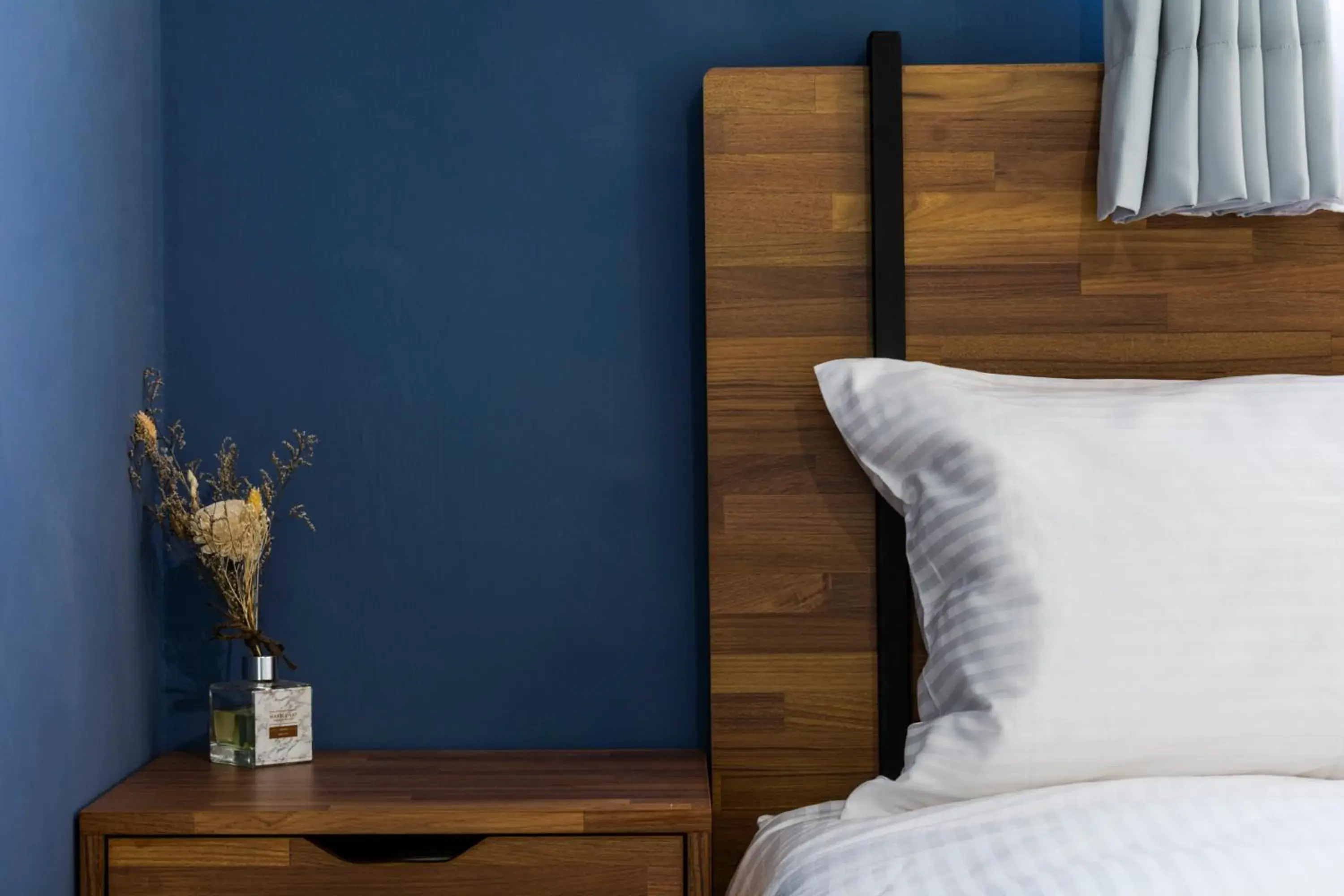 Bed in 沐藍輕旅 Mulan Light Inn I 海安路住宿 Bed in 沐藍輕旅 Mulan Light Inn I 海安路住宿