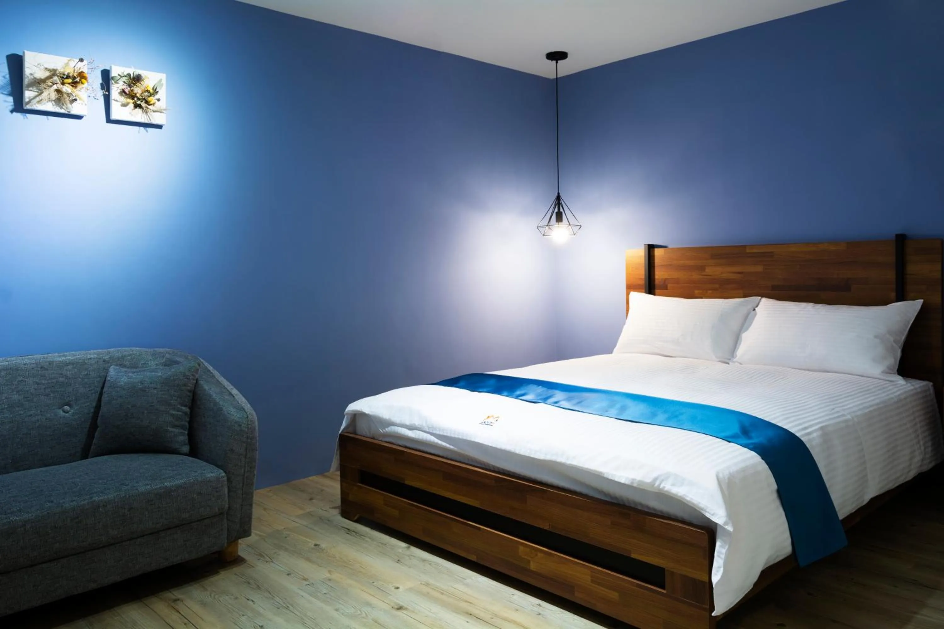 Bed in 沐藍輕旅 Mulan Light Inn I 海安路住宿