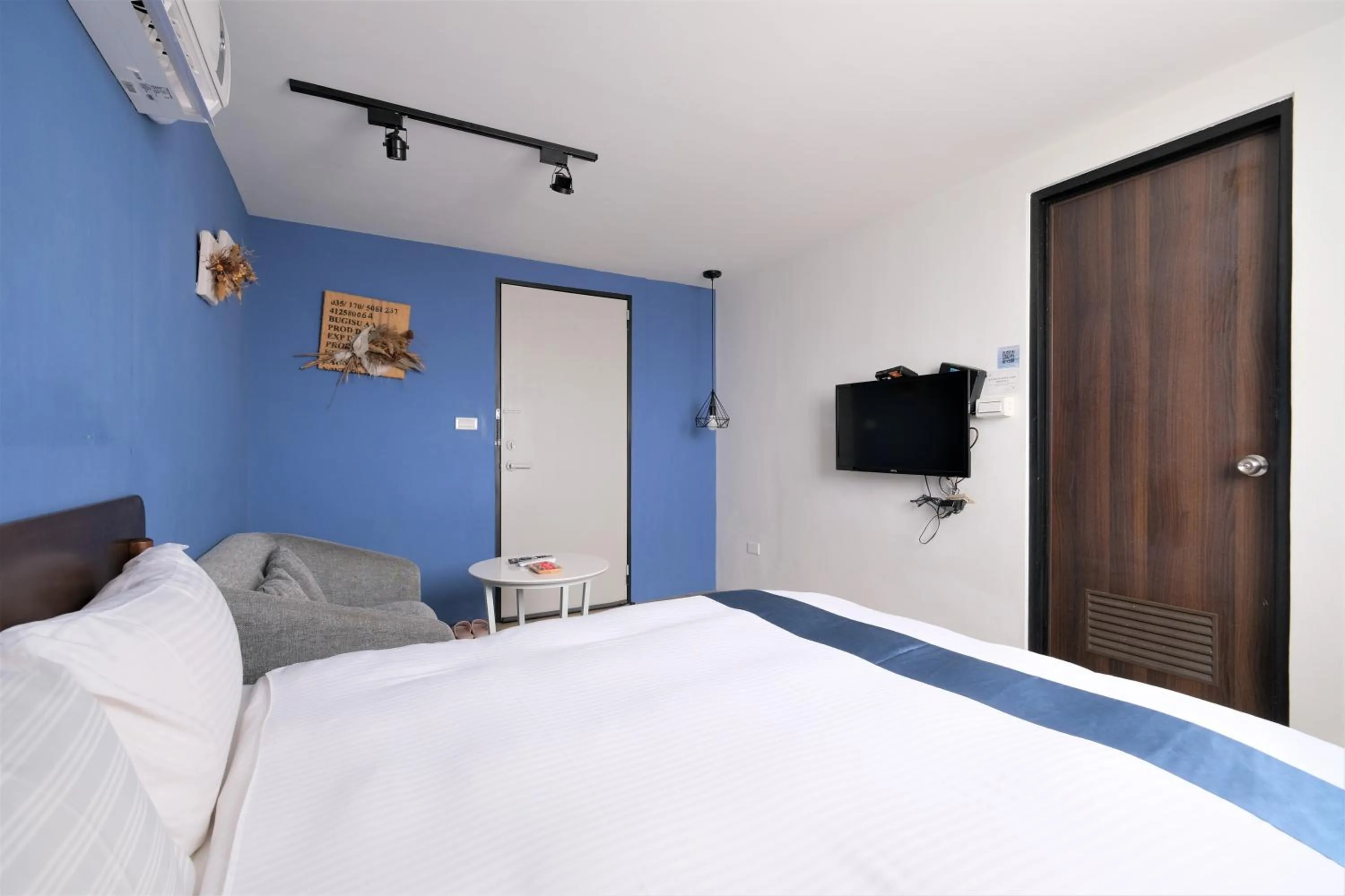 Bed in 沐藍輕旅 Mulan Light Inn I 海安路住宿