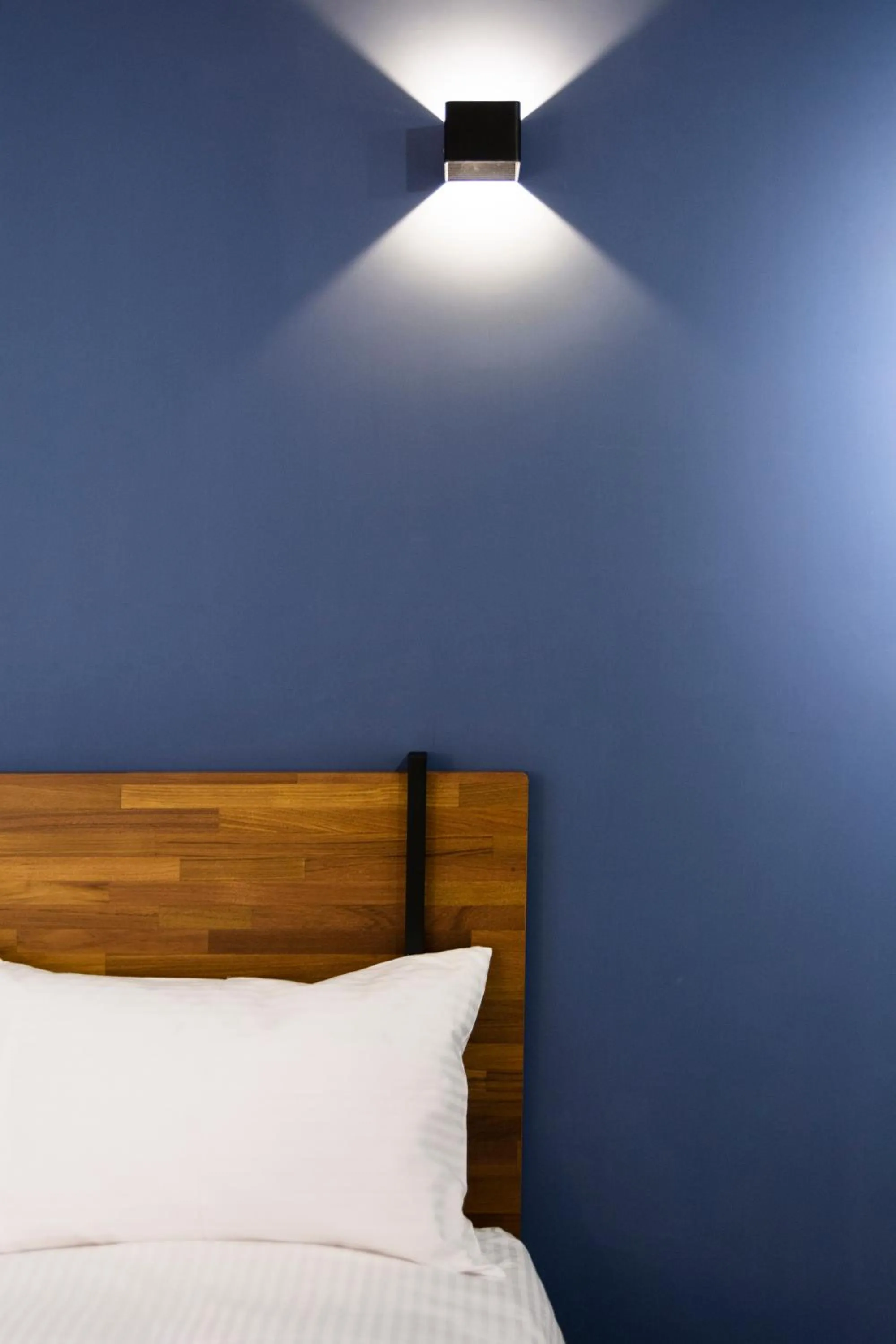 Bed in 沐藍輕旅 Mulan Light Inn I 海安路住宿