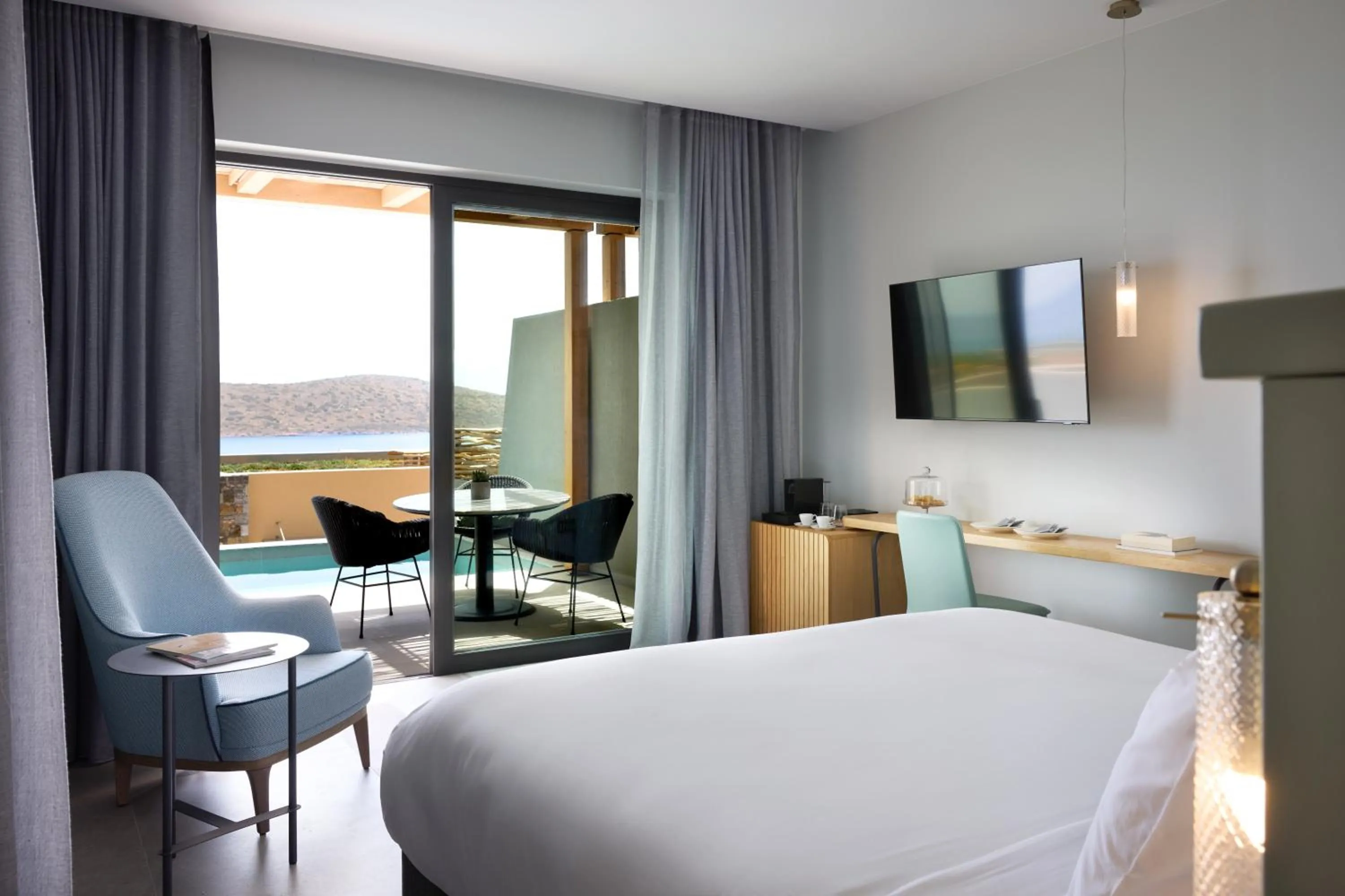 Bed in Cayo Exclusive Resort & Spa