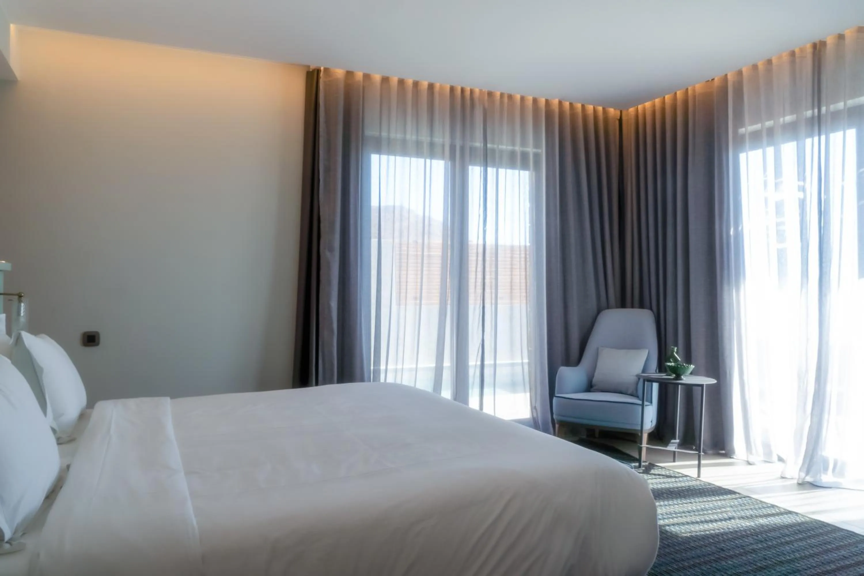 Bed in Cayo Exclusive Resort & Spa