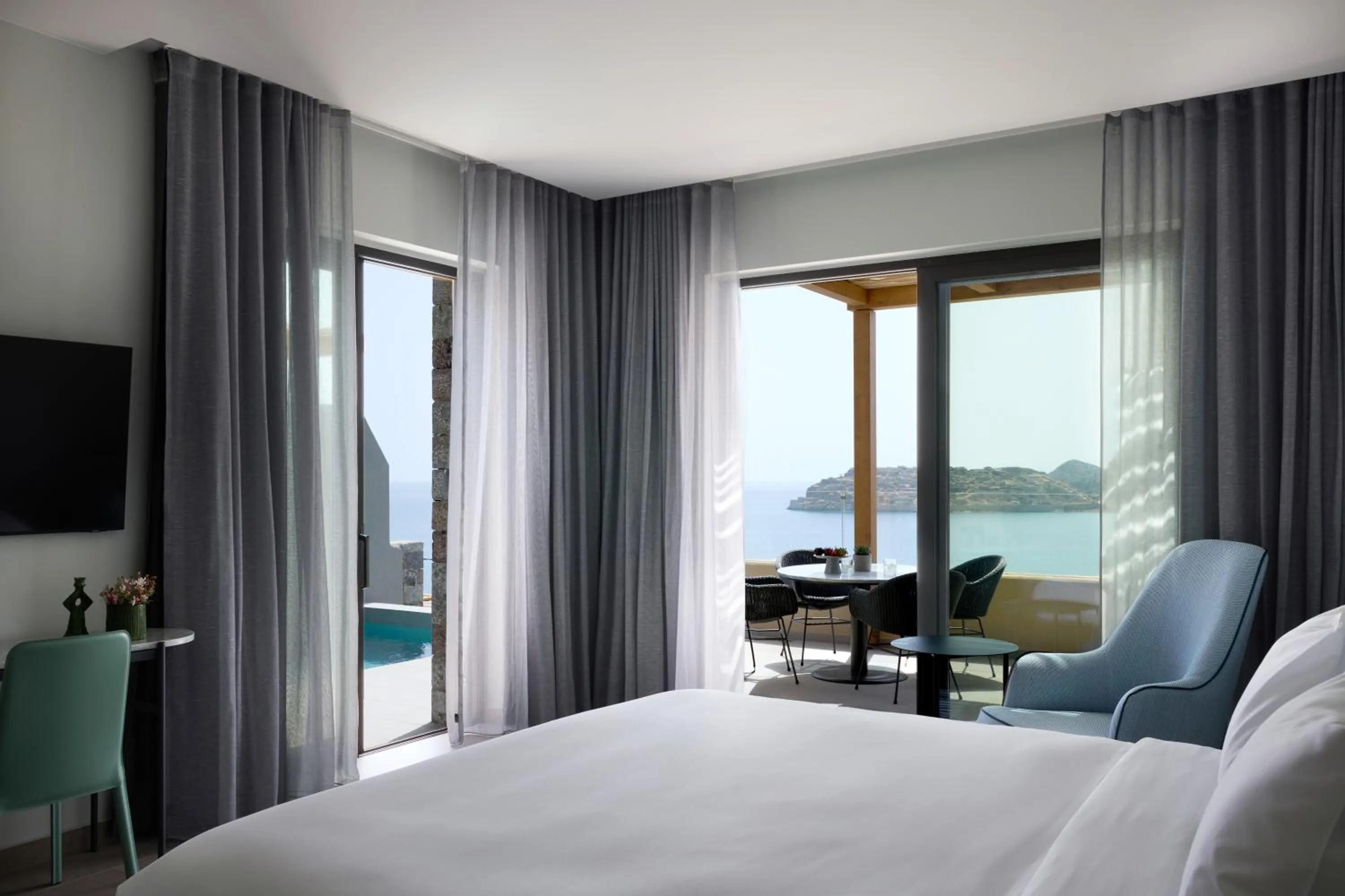 Bed in Cayo Exclusive Resort & Spa