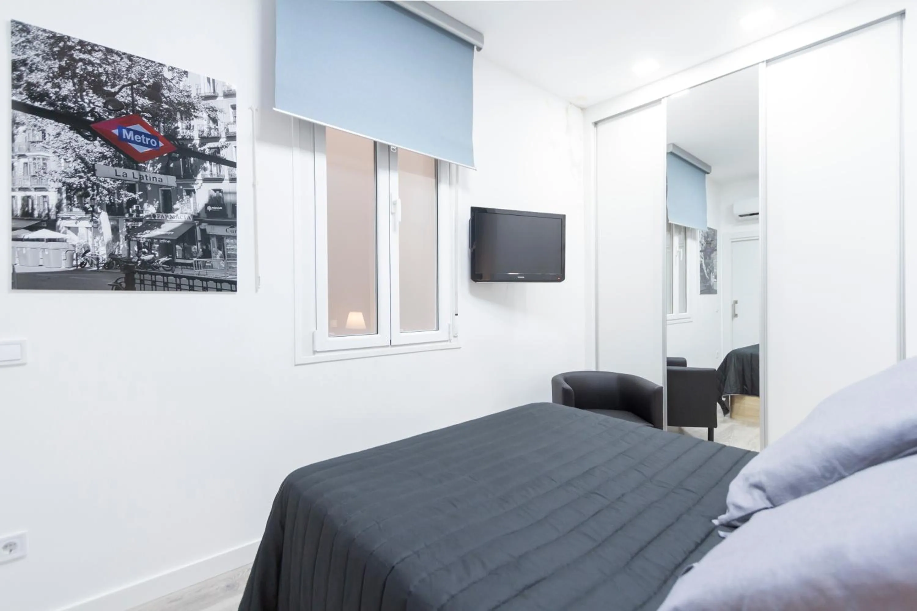 Bed in Plaza Mayor Apartment