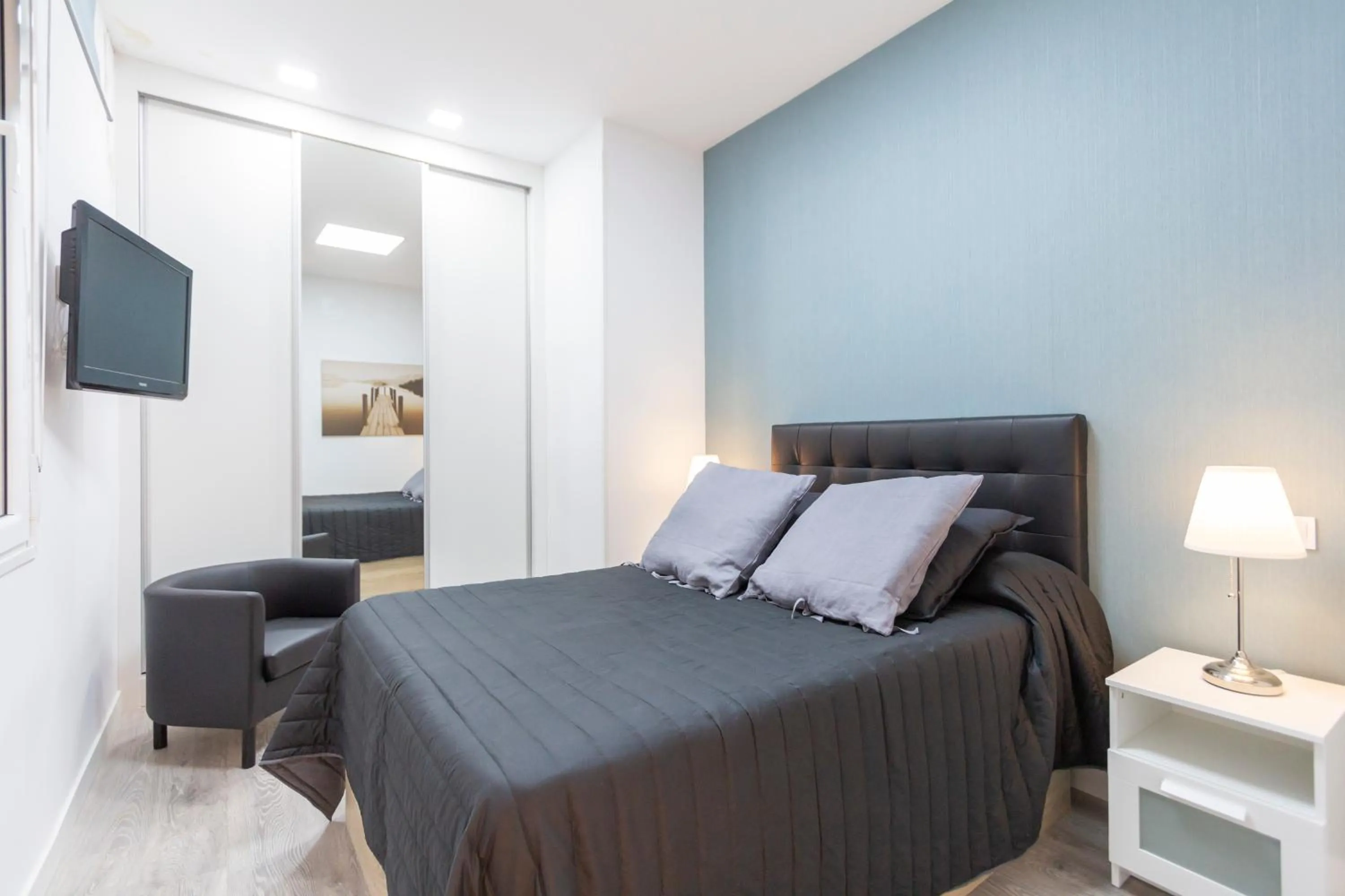 Bed in Plaza Mayor Apartment